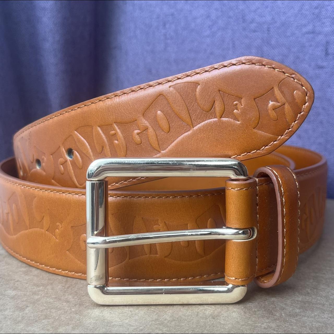 GOLF WANG Debossed 34-38 inch orange leather belt... - Depop