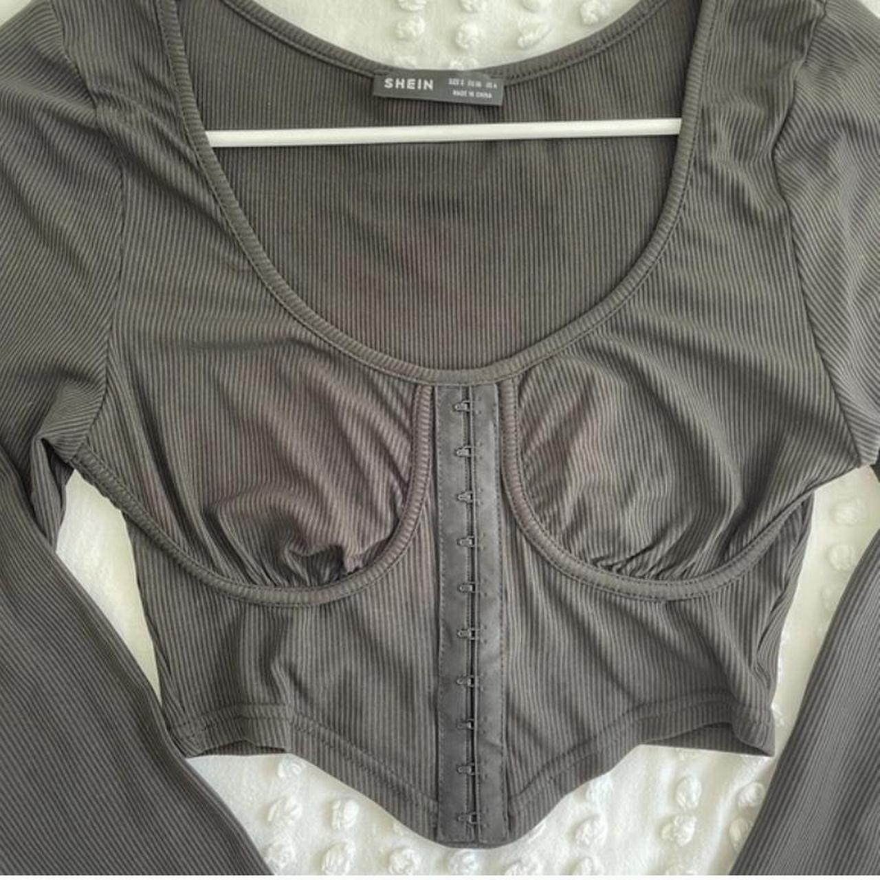 Black long sleeve corset top - worn a couple... - Depop
