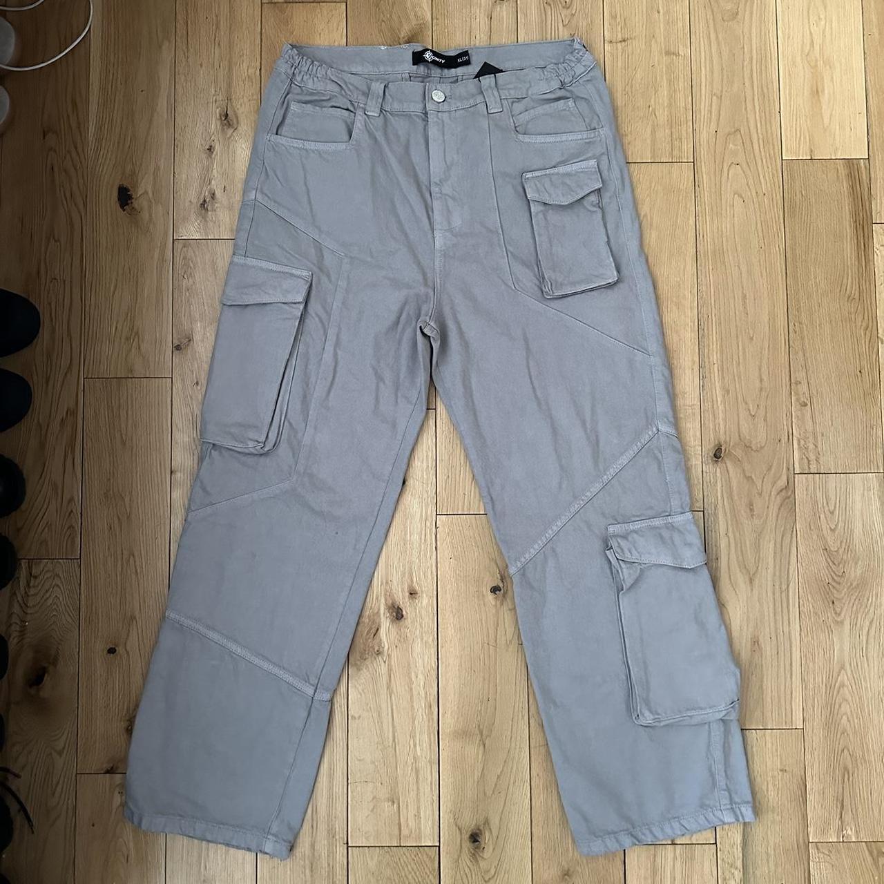 Vicinity Asymetrical Cargo Pants color:... - Depop