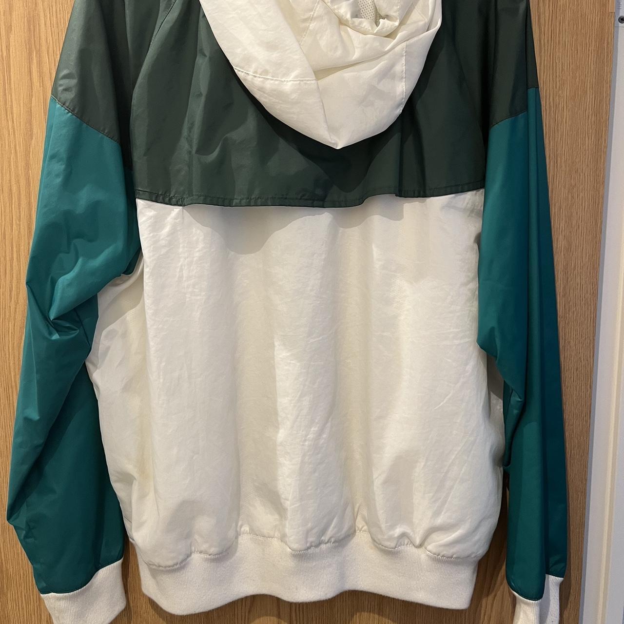 dark green nike windbreaker