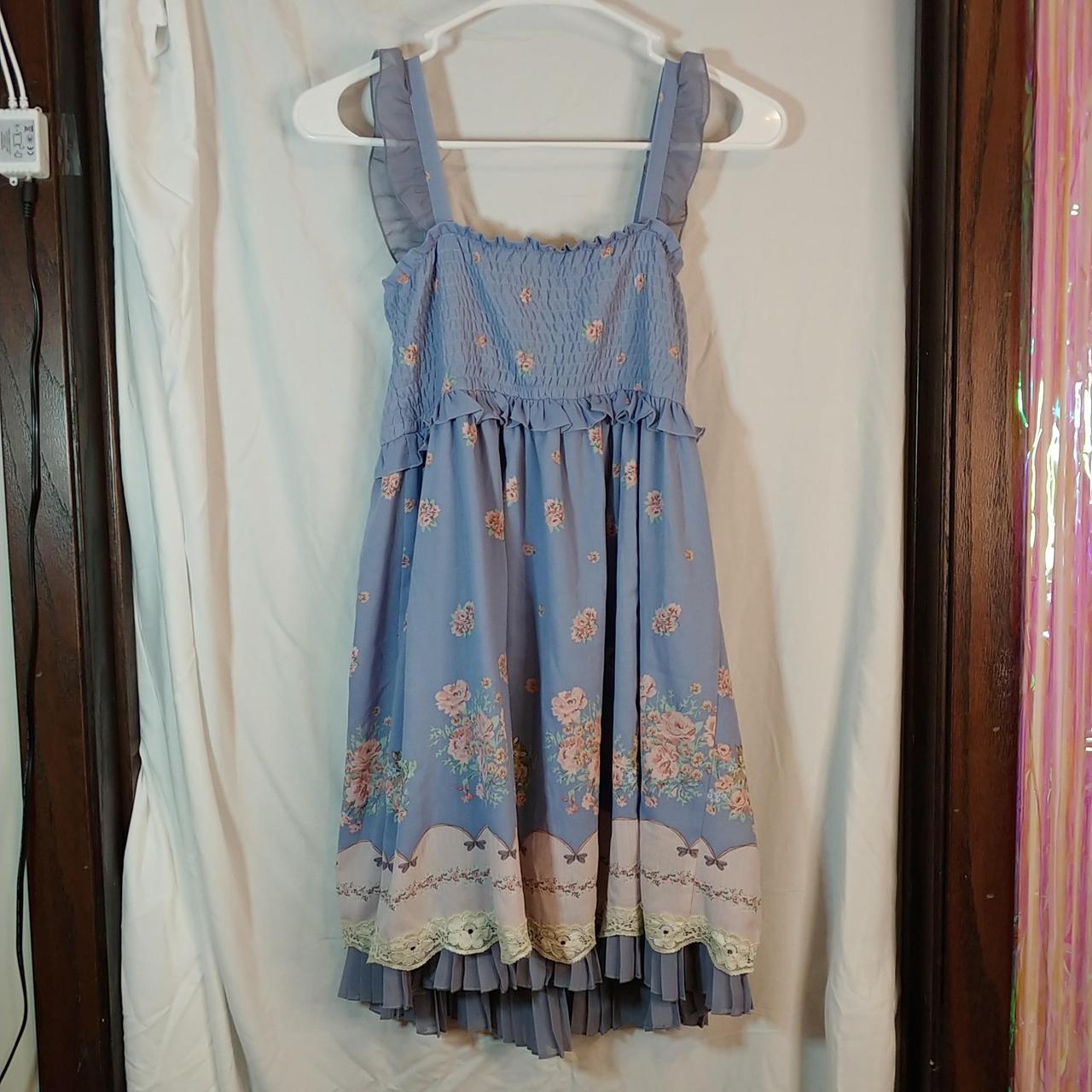 axes femme blue mini dress with floral print. size... Depop