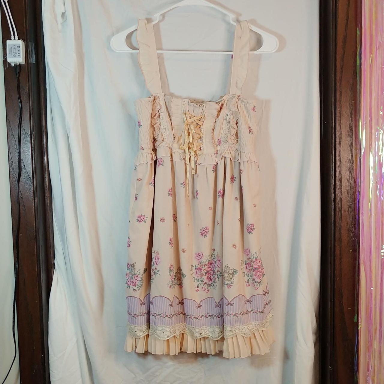 axes femme pink mini dress with floral print. size... Depop