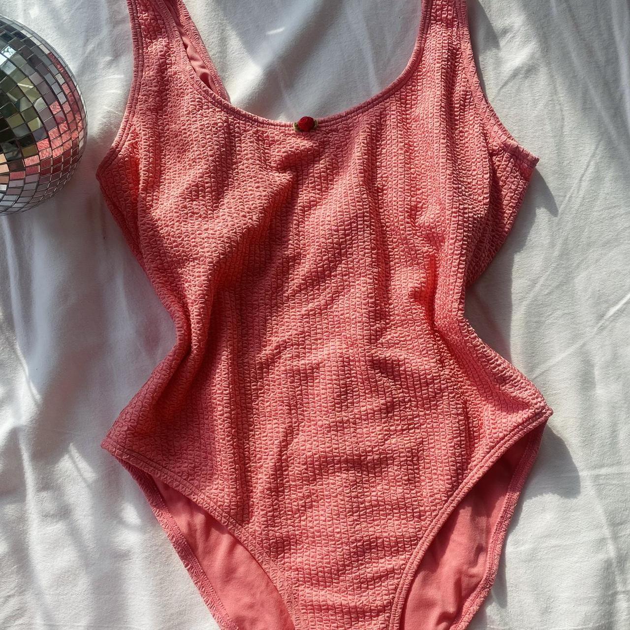 Vintage Betsey Johnson one piece swim suit. She is a