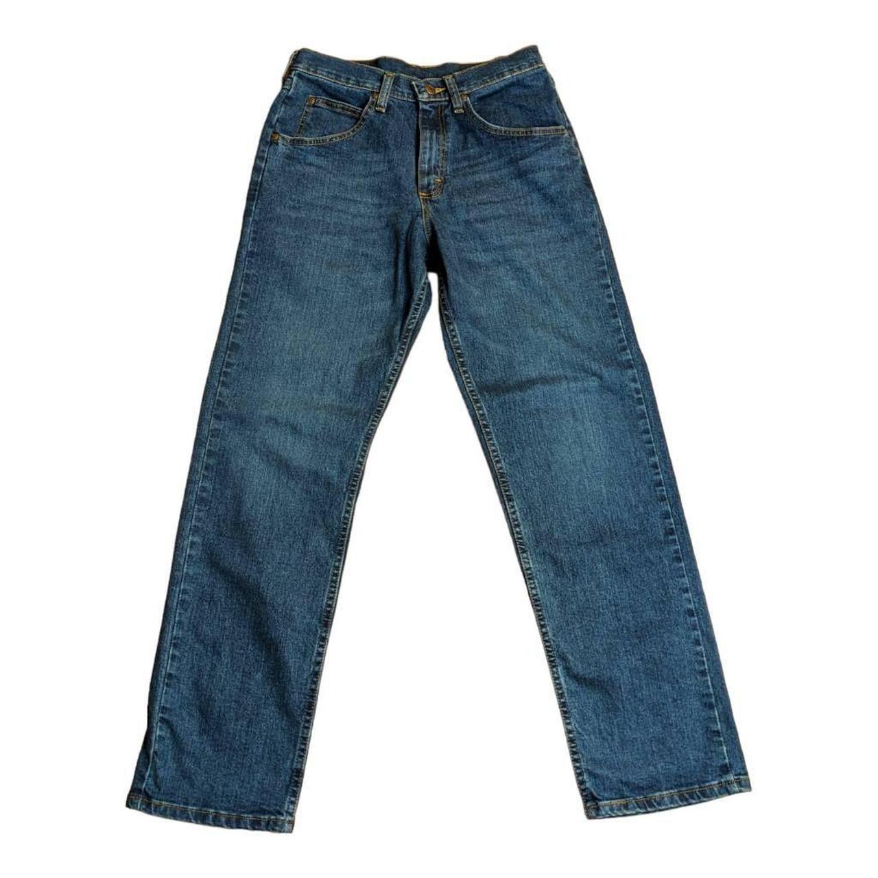 A pair of men's Wrangler relaxed fit jeans in... - Depop