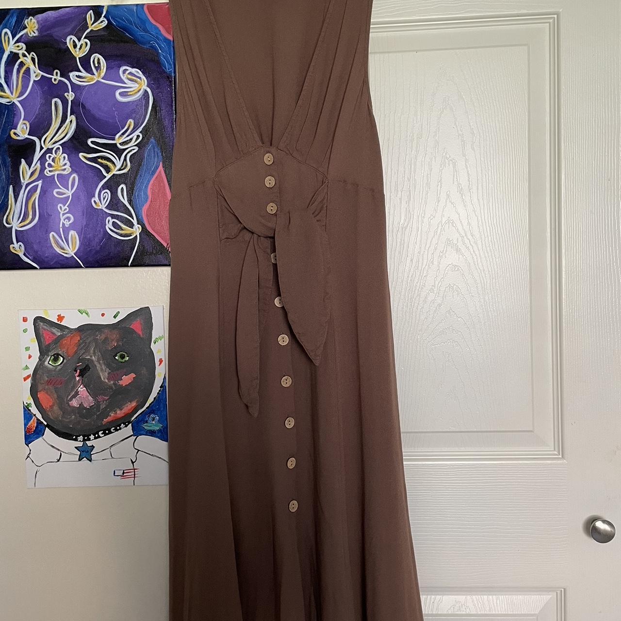 Brown maxi dress that buttons up and ties at the... - Depop