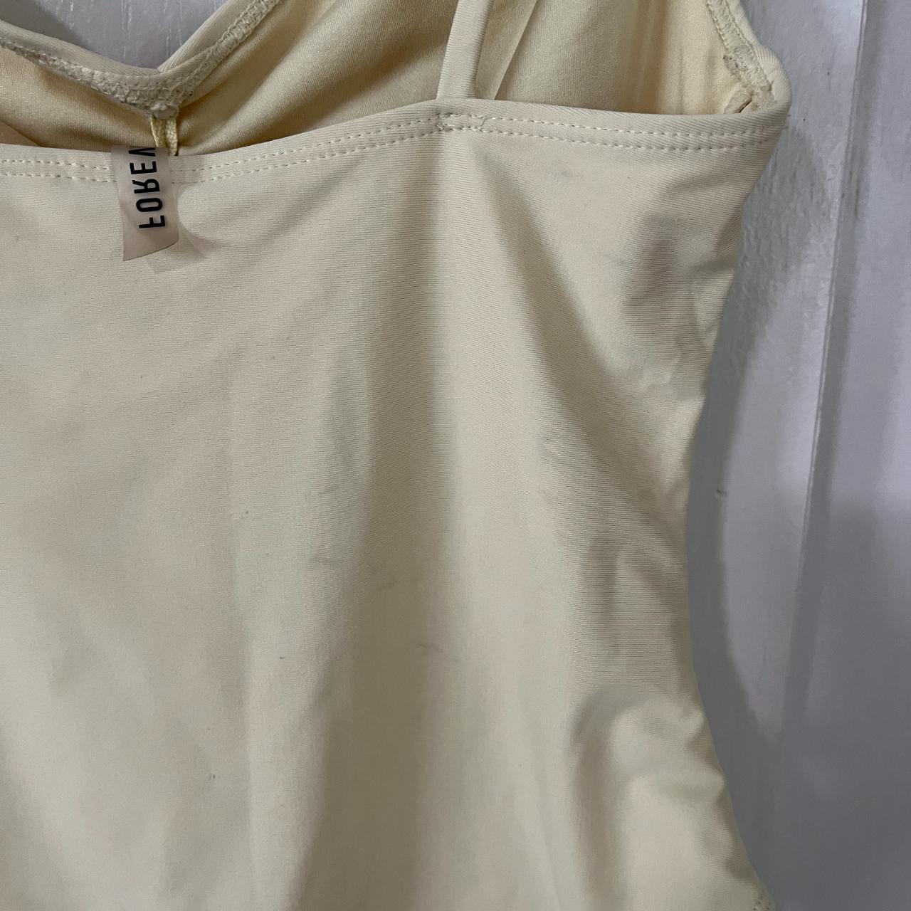 Yellow One Piece Swimsuit. Pale yellow one piece... Depop