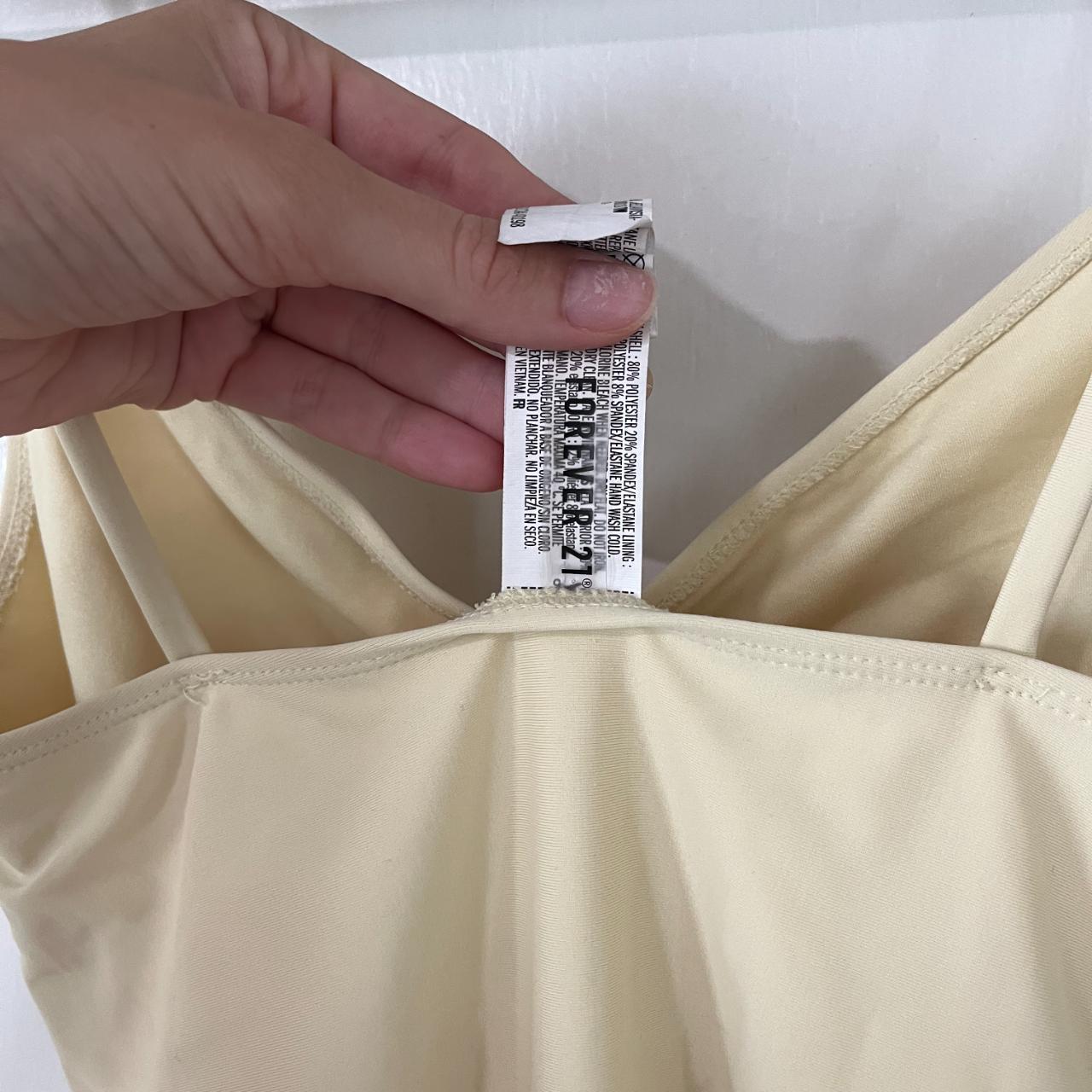Yellow One Piece Swimsuit. Pale yellow one piece... - Depop