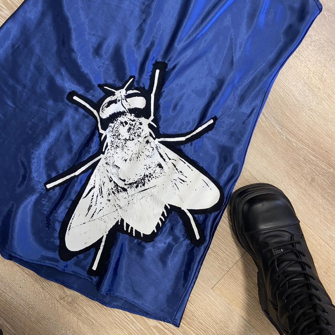 Blue babydoll slip dress with a fly patch Reworked... Depop