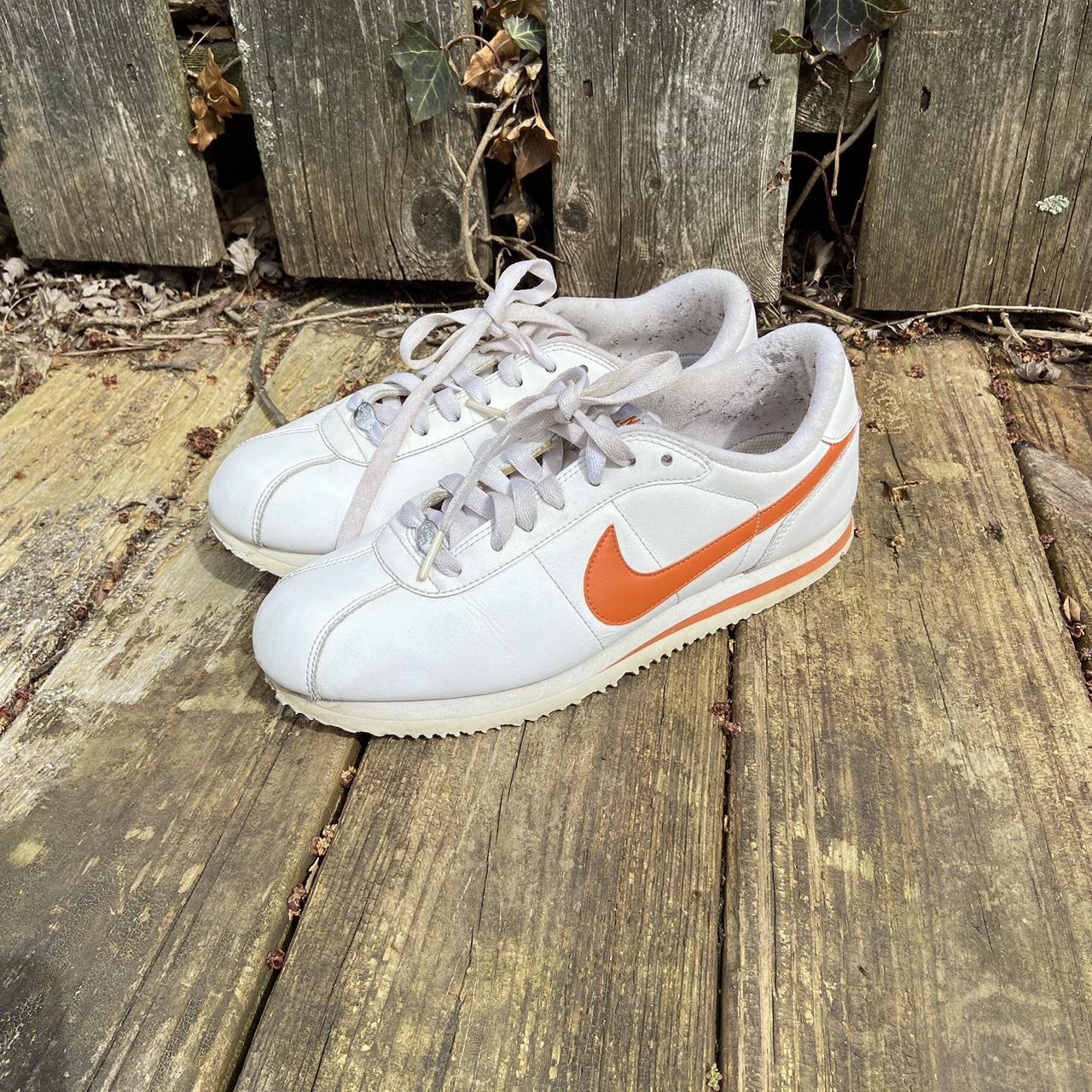 mens orange and white nike shoes