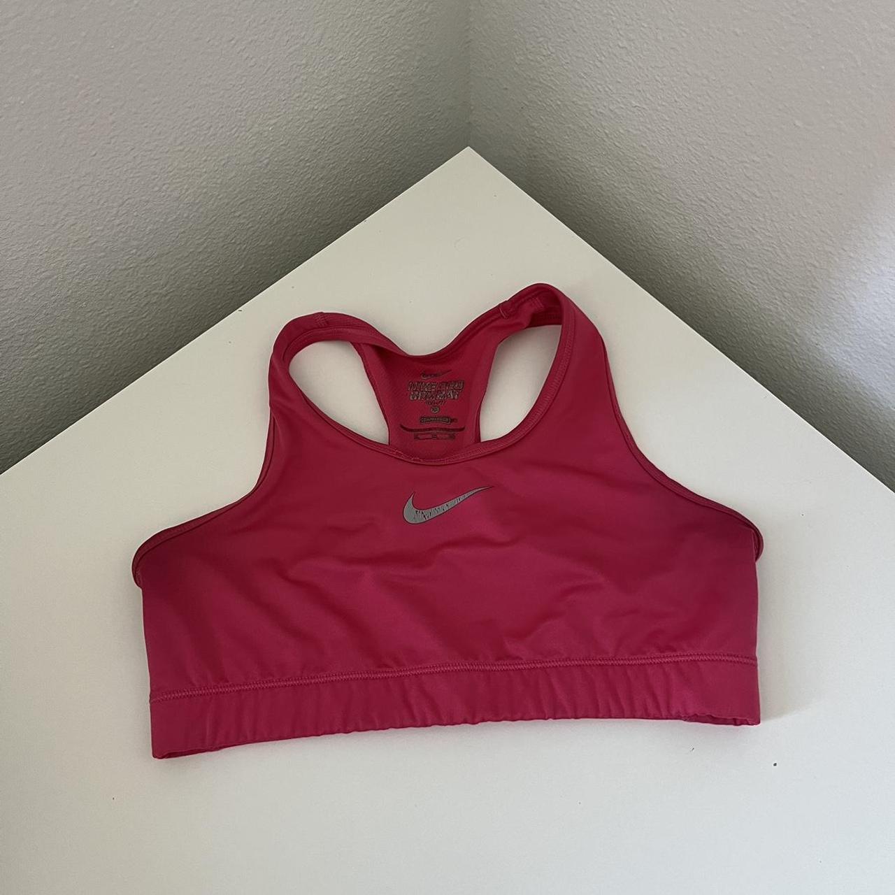 Pink Nike sports bra, kids xl but fits a womens s... - Depop