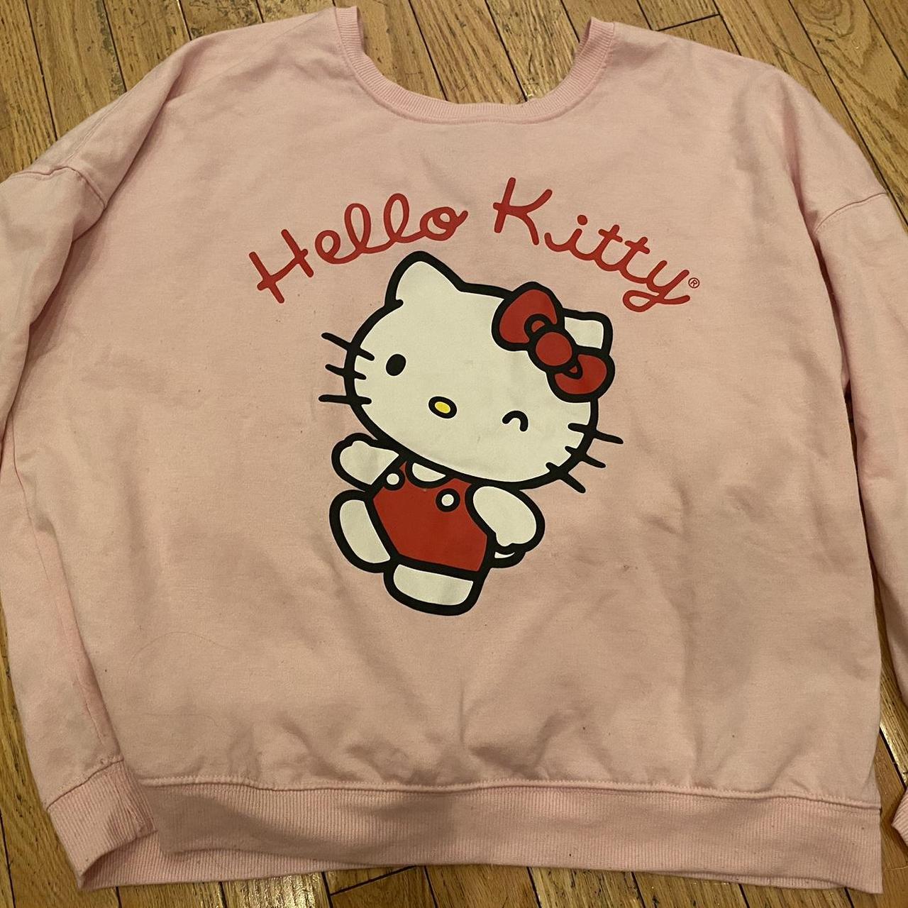 hello kitty sweatshirt! i am a size small and it... - Depop