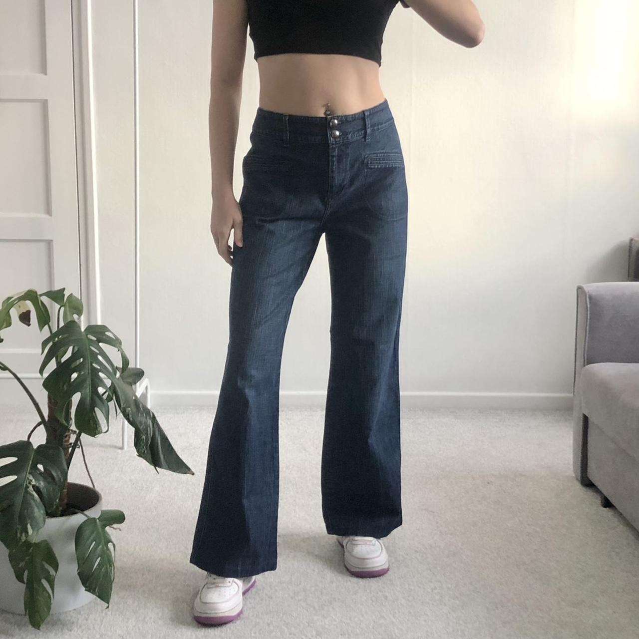 Y2K mid rise flared jeans in a dark wash blue... - Depop