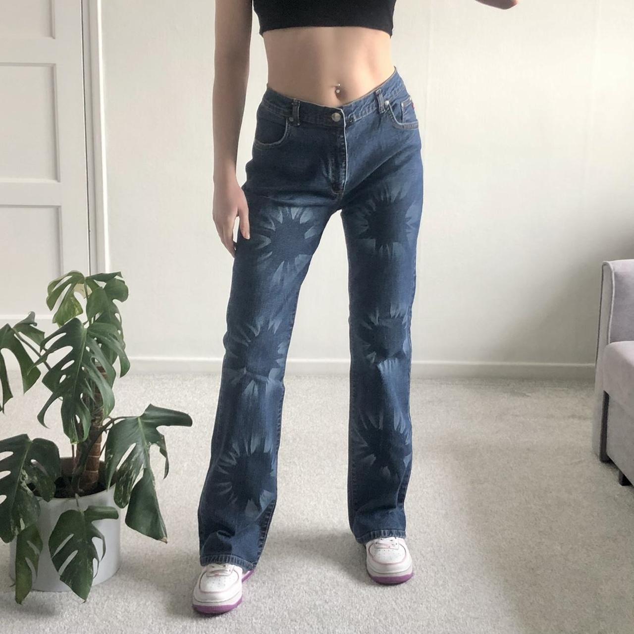 Y2K mid rise tie dye flared jeans in a dark wash... - Depop