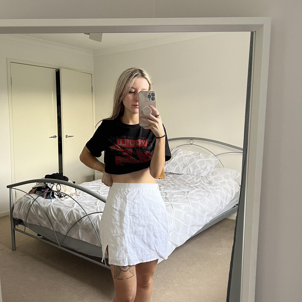 White mini skirt, not sure on the brand as the tag... | Depop