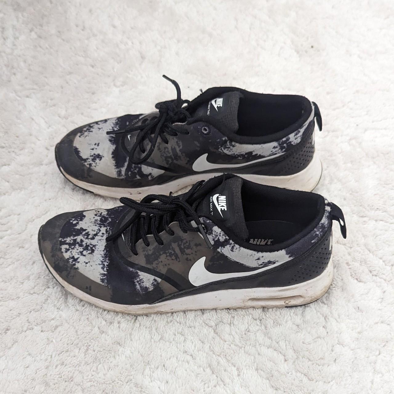 black nike thea trainers