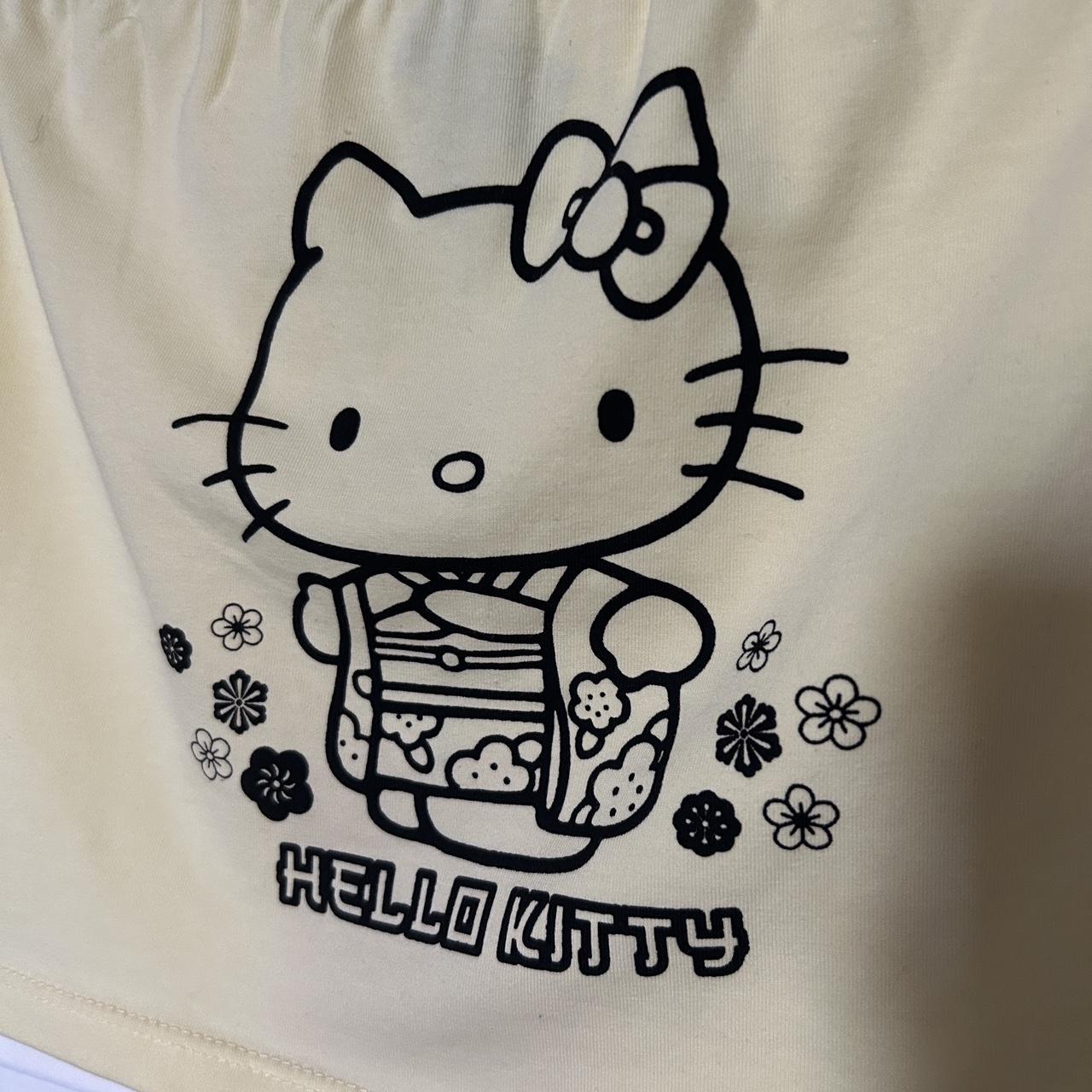 BNWT hello kitty yellow graphic tube crop top. Such... - Depop