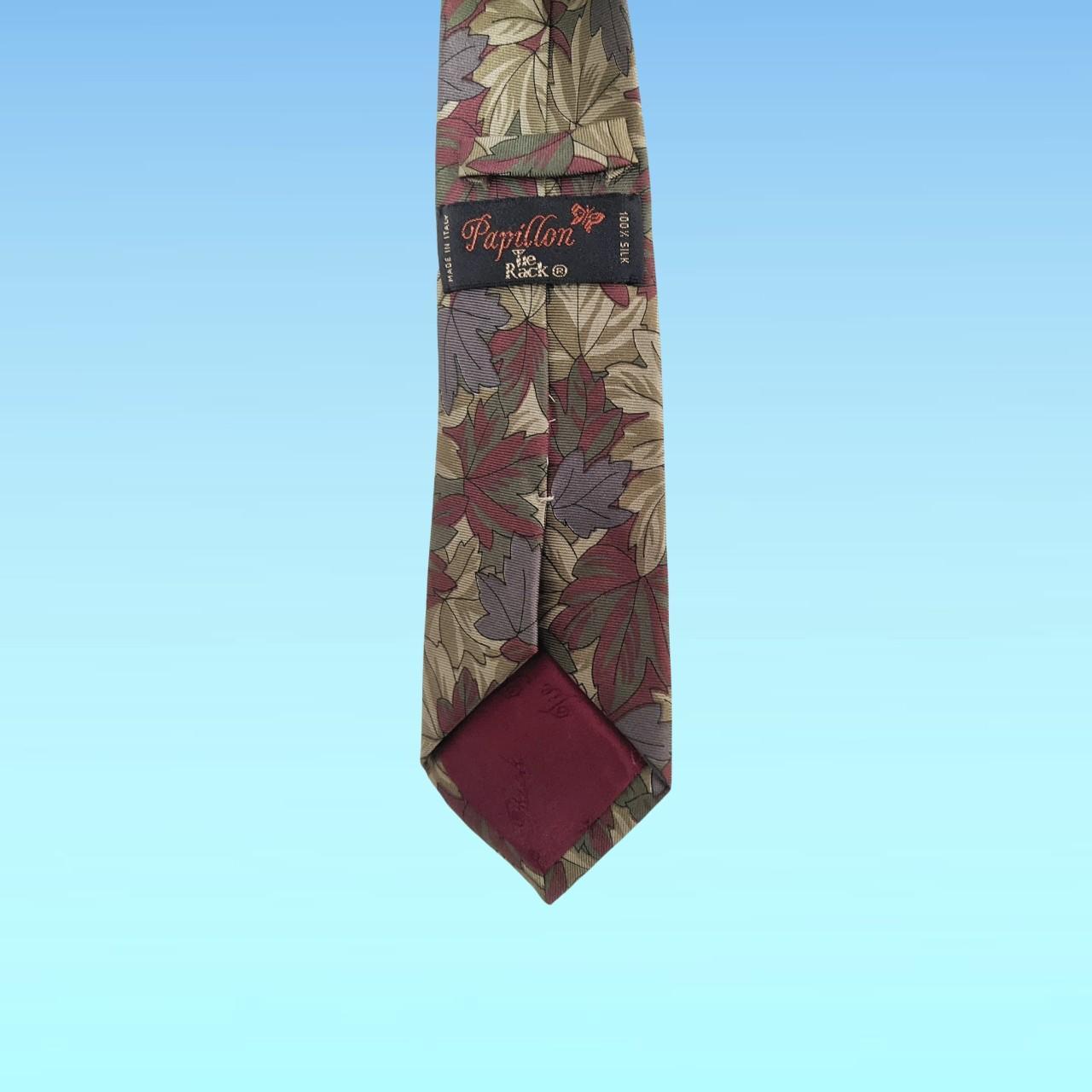 Vintage Italian silk tie. Floral pattern. Hues of... - Depop