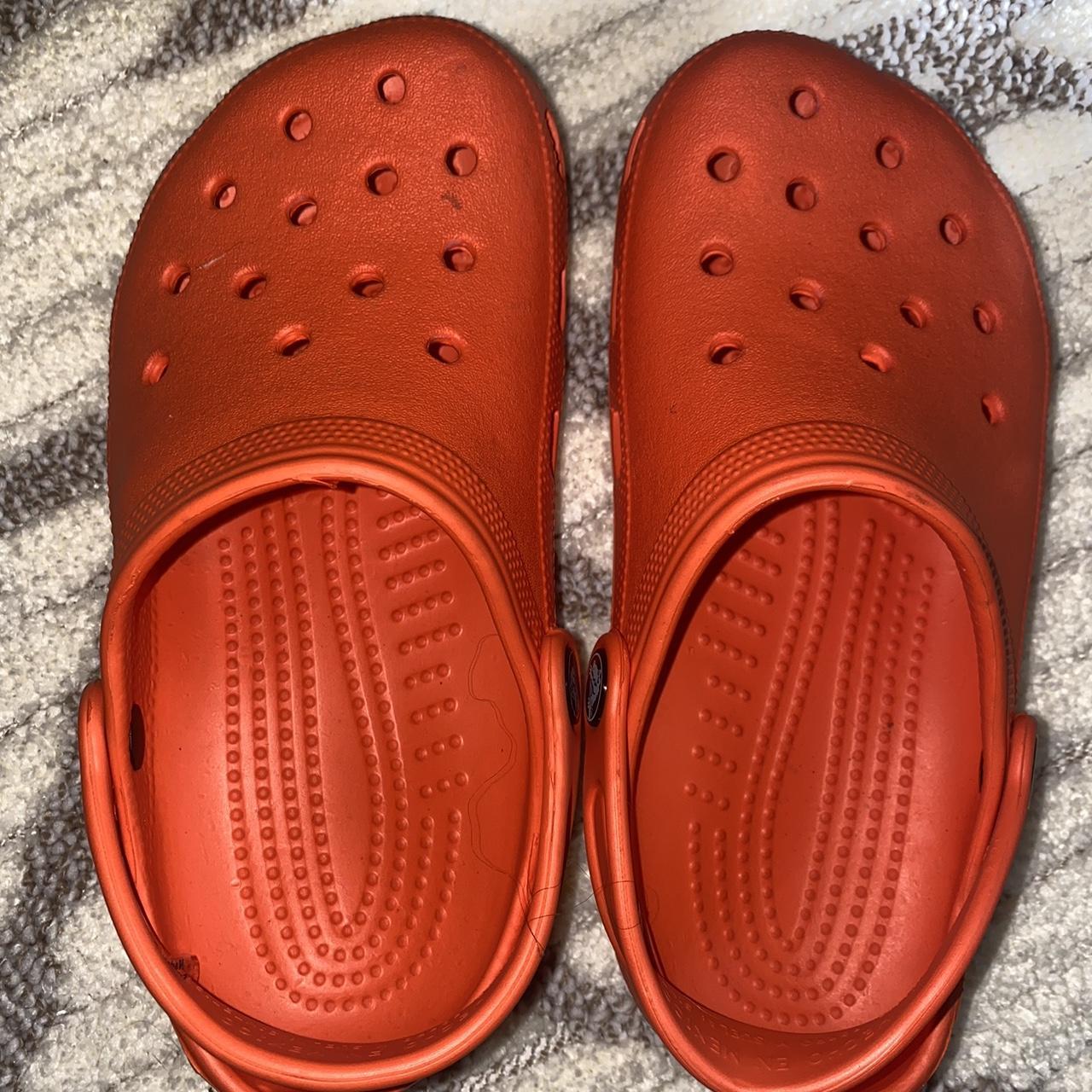 Orange crocs size 3. Fits women s 5. Wore a handful