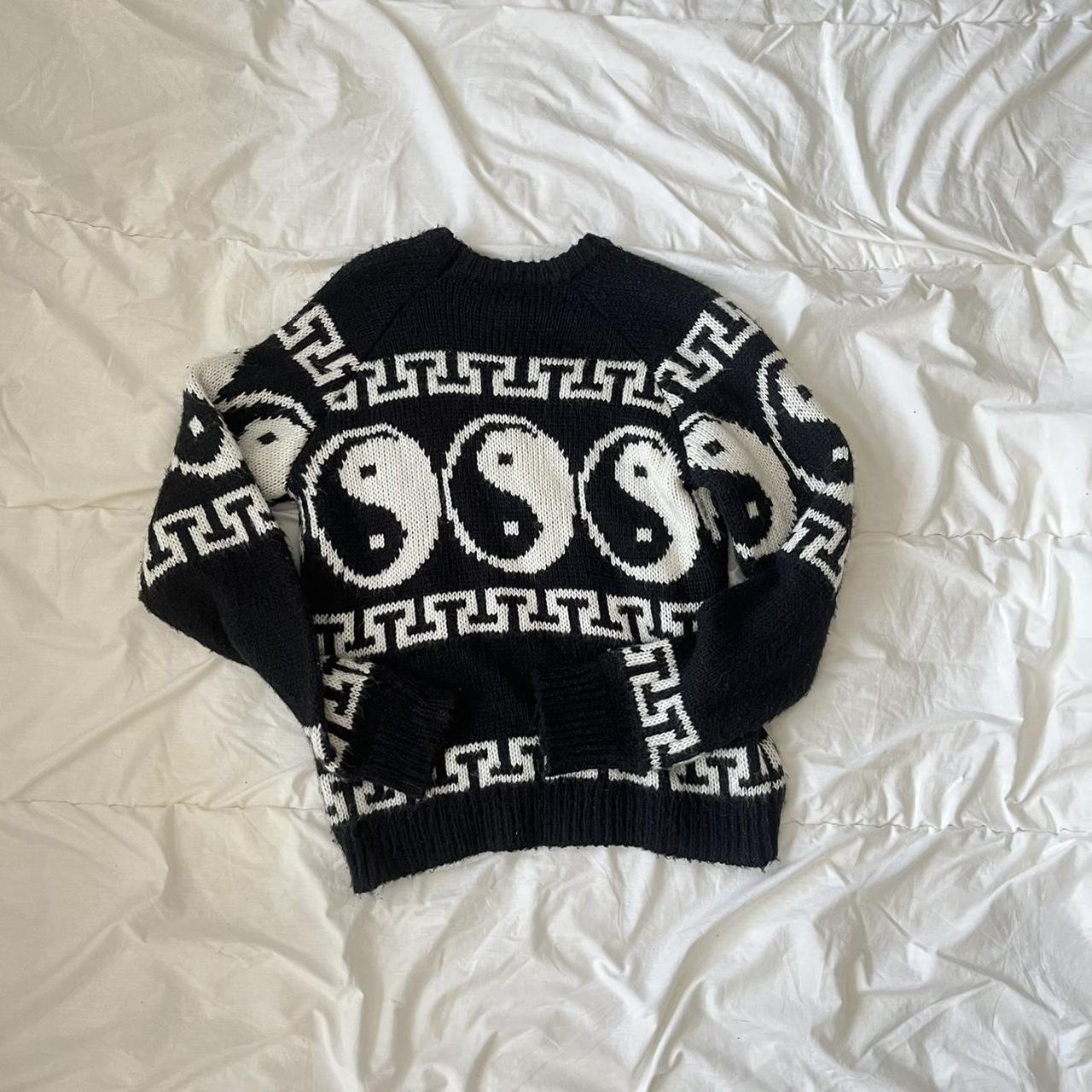 Black and white Yin Yang sweater from UO Cooke