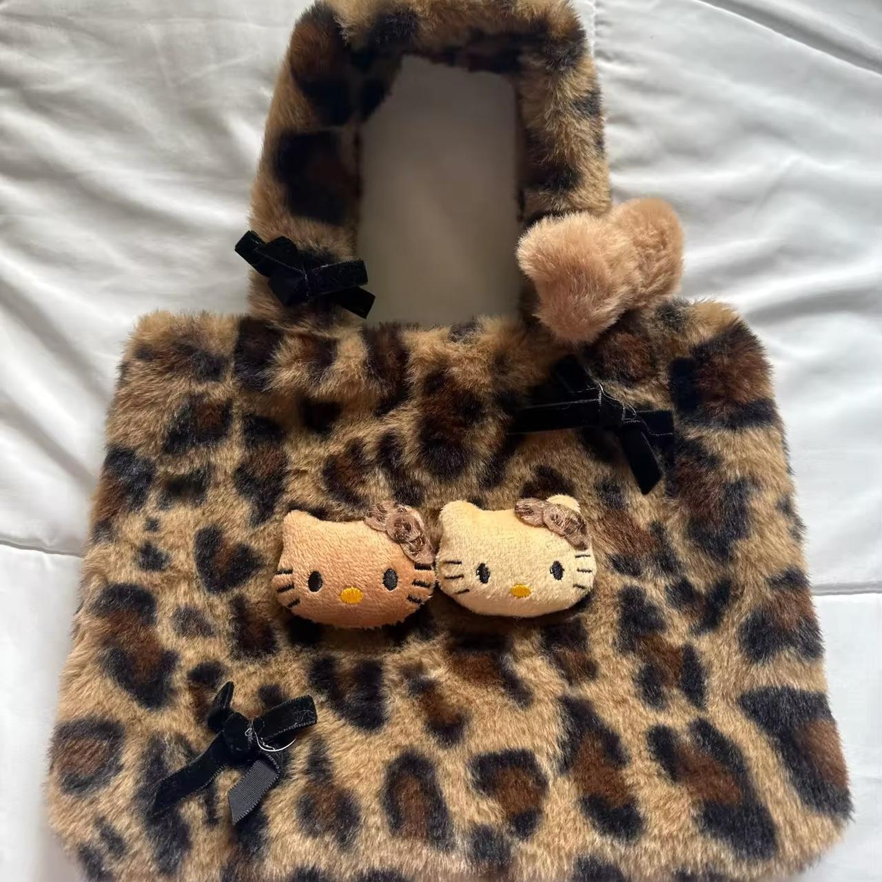 small leopard print hello kitty bag with pom poms 🤎... - Depop