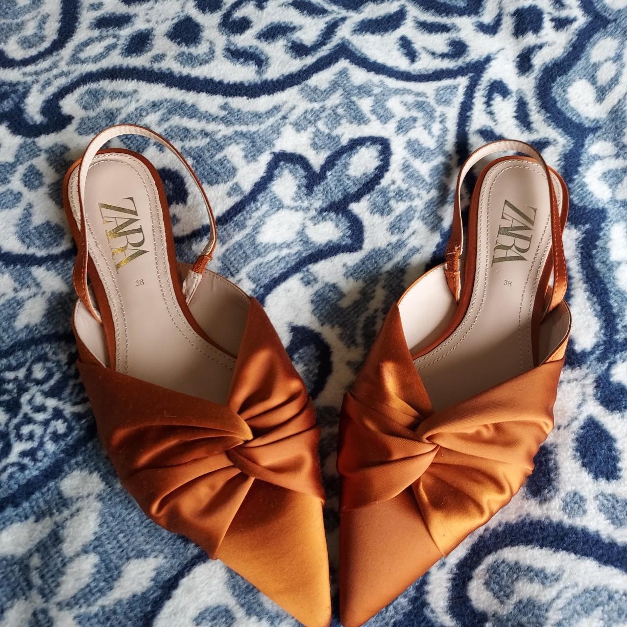 Zara store orange shoes