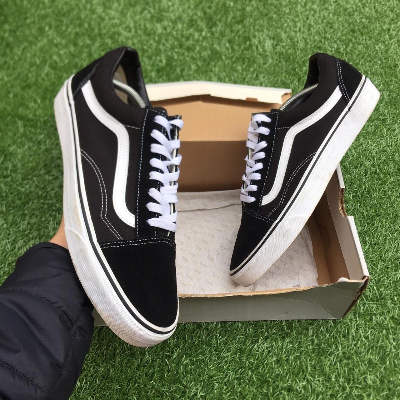 Vans Men's White and Black Trainers | Depop