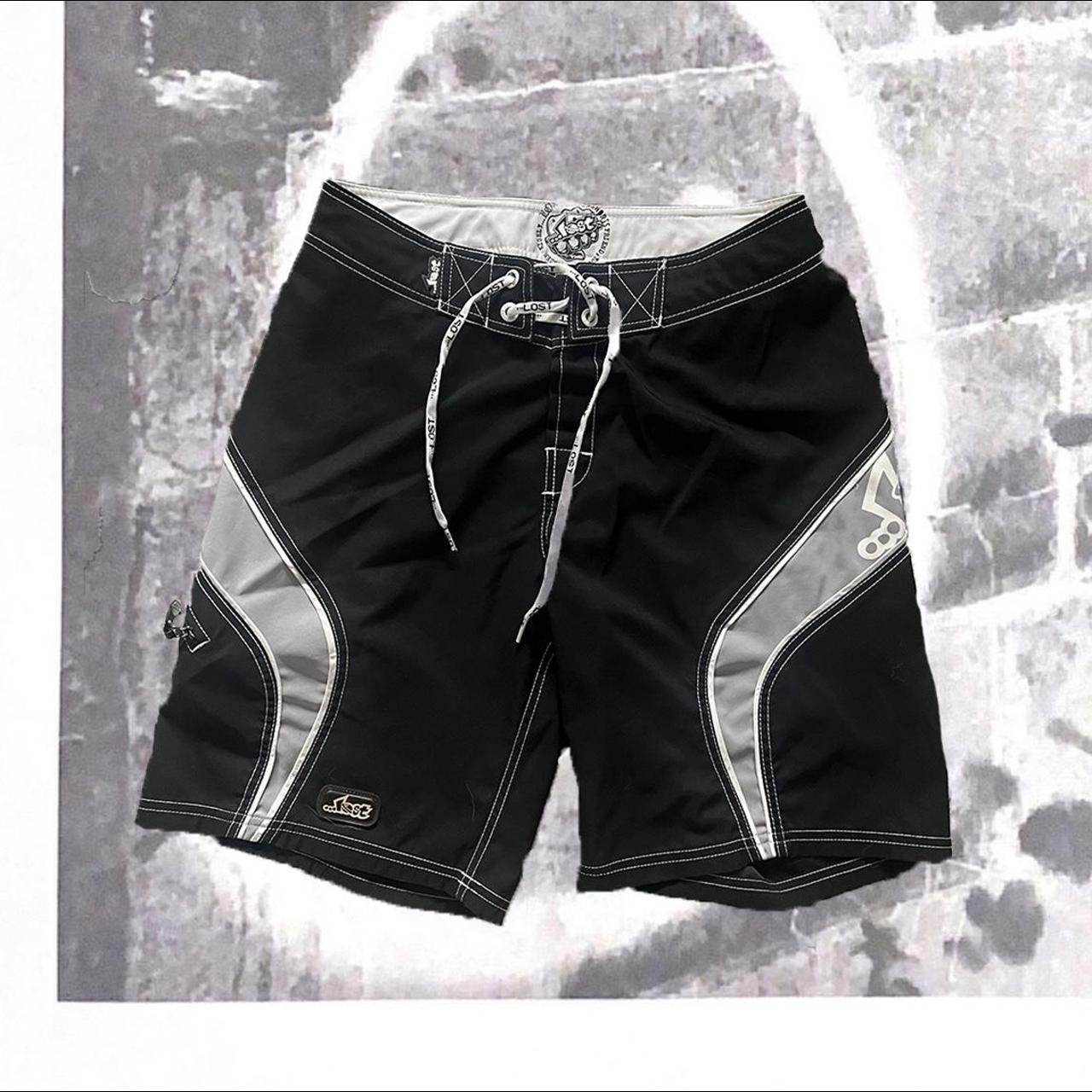 Lost swim trunks size 30 black and gray board shorts... Depop