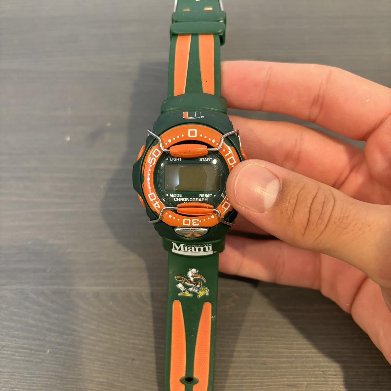 Really cool UMIAMI sports watch, green and orange,... - Depop