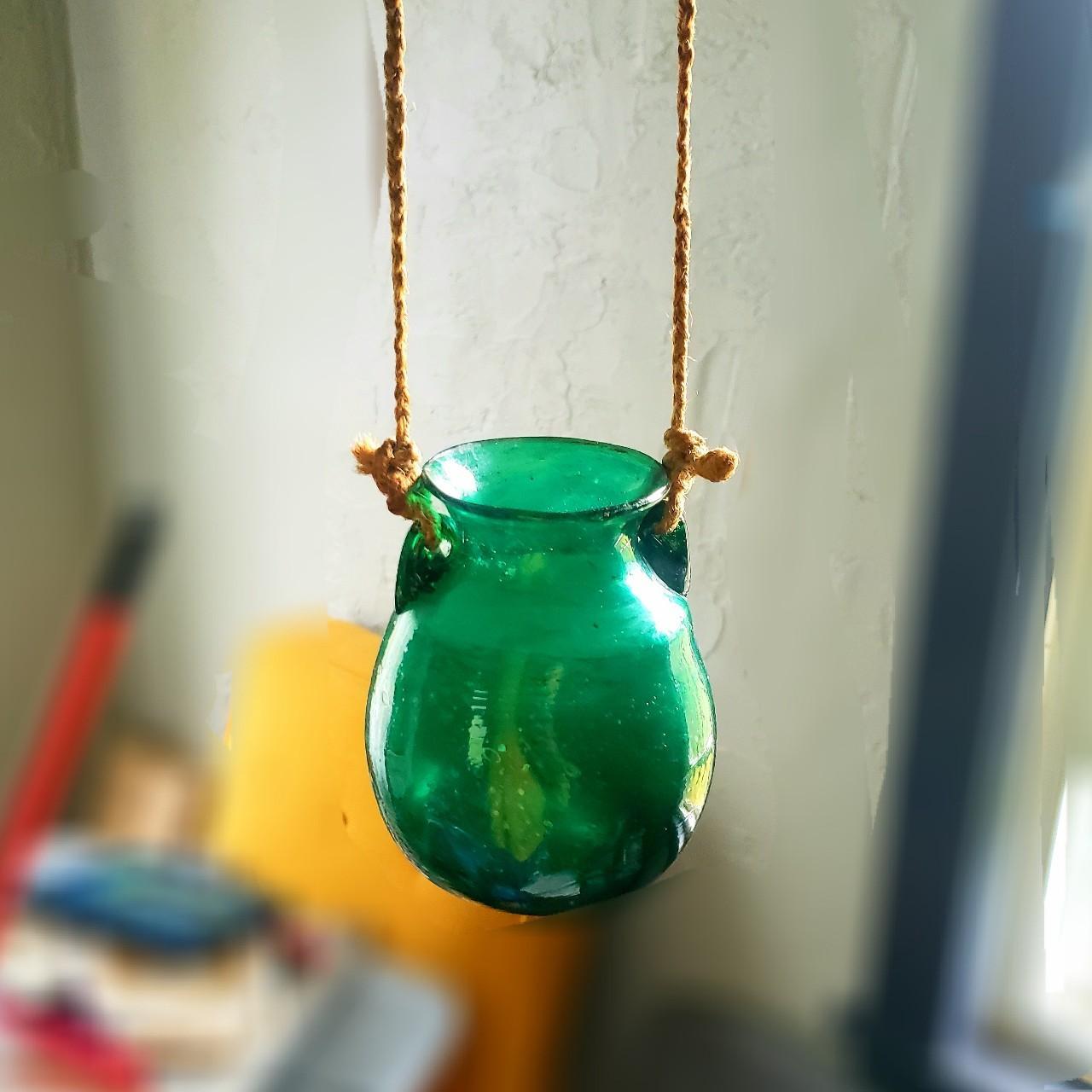 emerald, green hand-blown glass candle holder