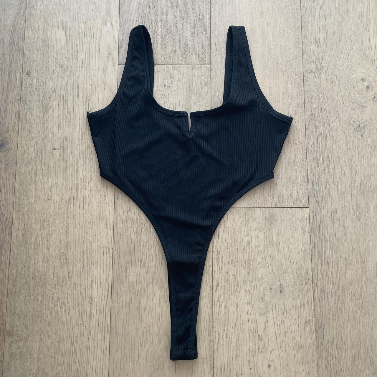 Adika bodysuit - has a notch made in the front,... - Depop