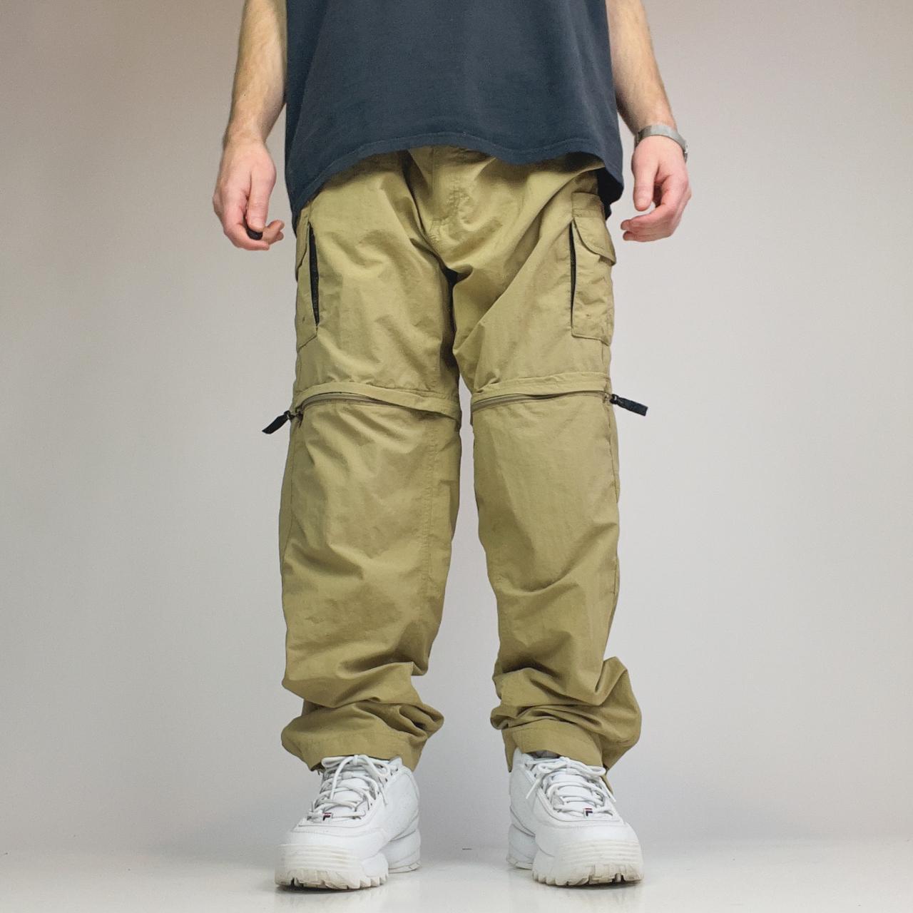 Tan Cargo Convertible Pants A baggy pair of khaki... Depop