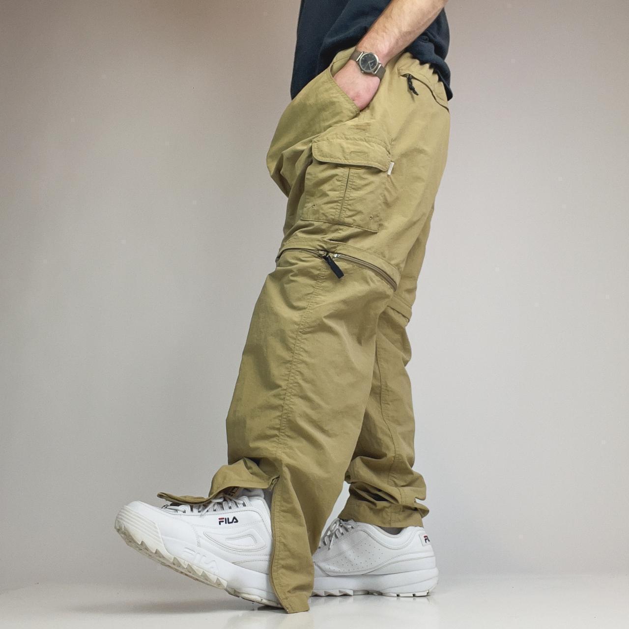 Magellan Cargo Hiking Pants A baggy pair of khaki... Depop