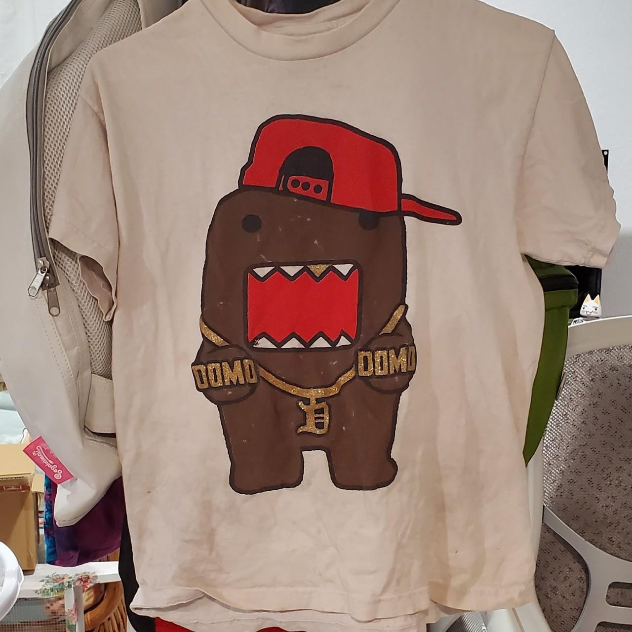 swag domo shirt. its in low condition. has a small... Depop