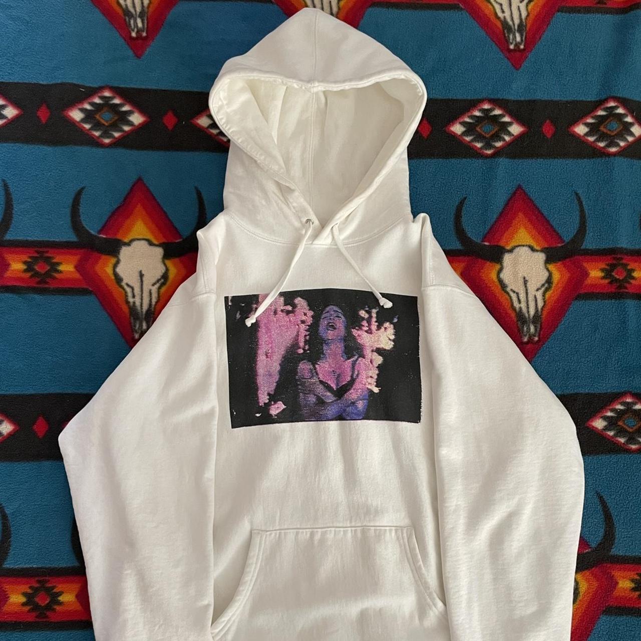 Supreme “Madonna burning crosses” hooded sweatshirt...