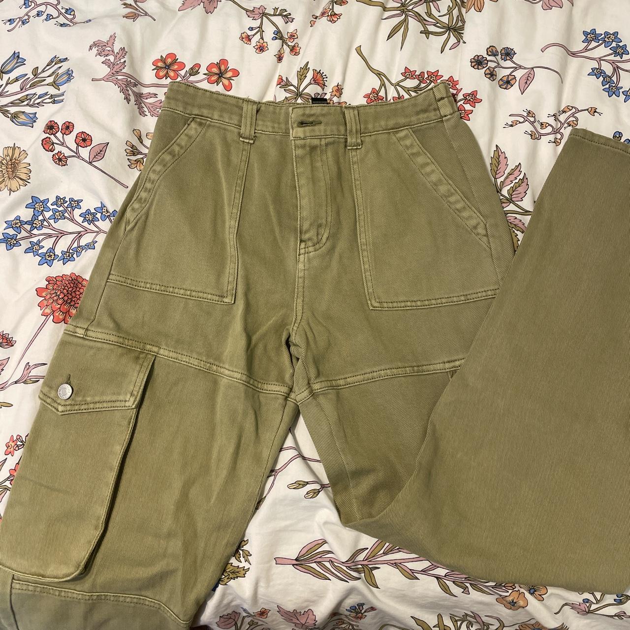 TWO pairs of cargo pants, one olive green, one light... - Depop