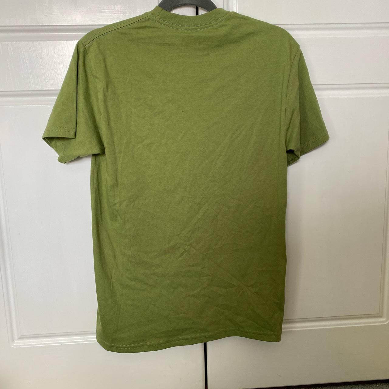 Pythia Green T-shirt This brand has been seen on... - Depop