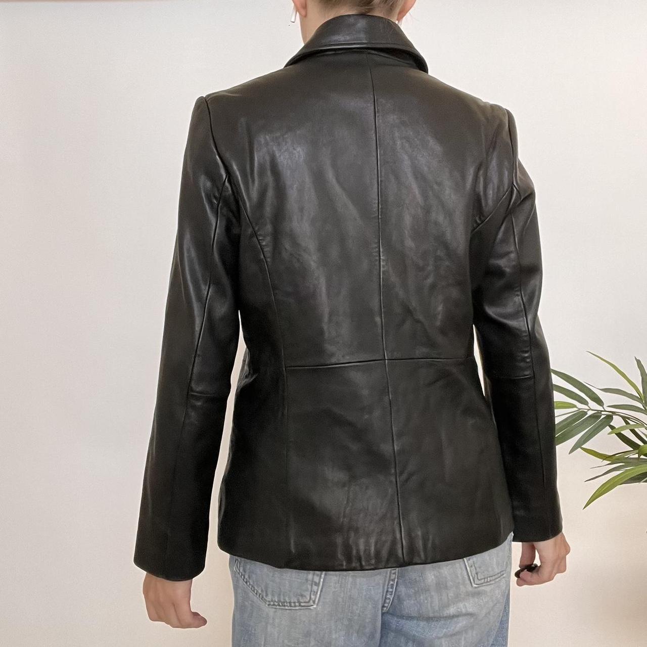 Black leather jacket with a collar and zipper, made... Depop