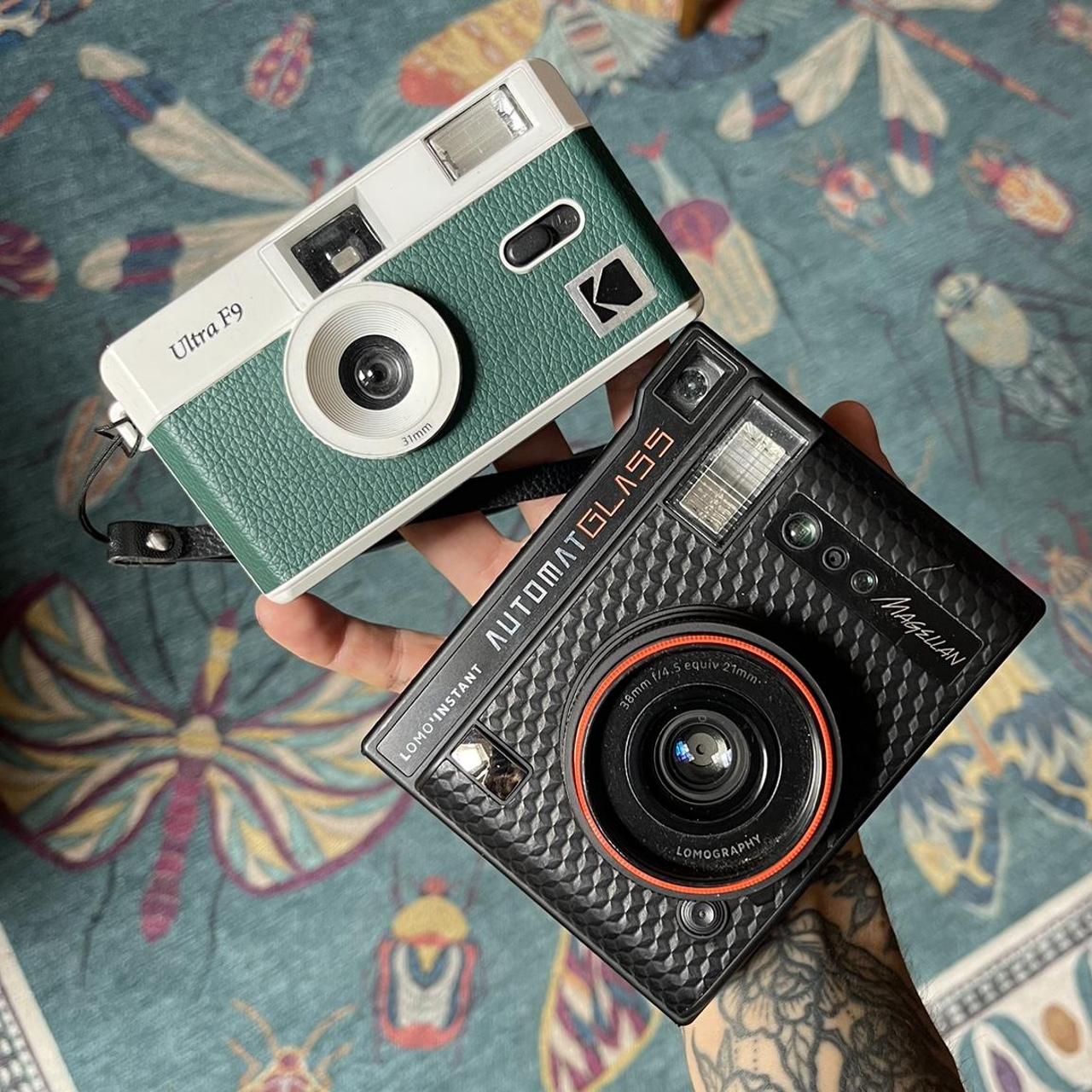 reusable film cameras! one is for 35mm film and the... Depop
