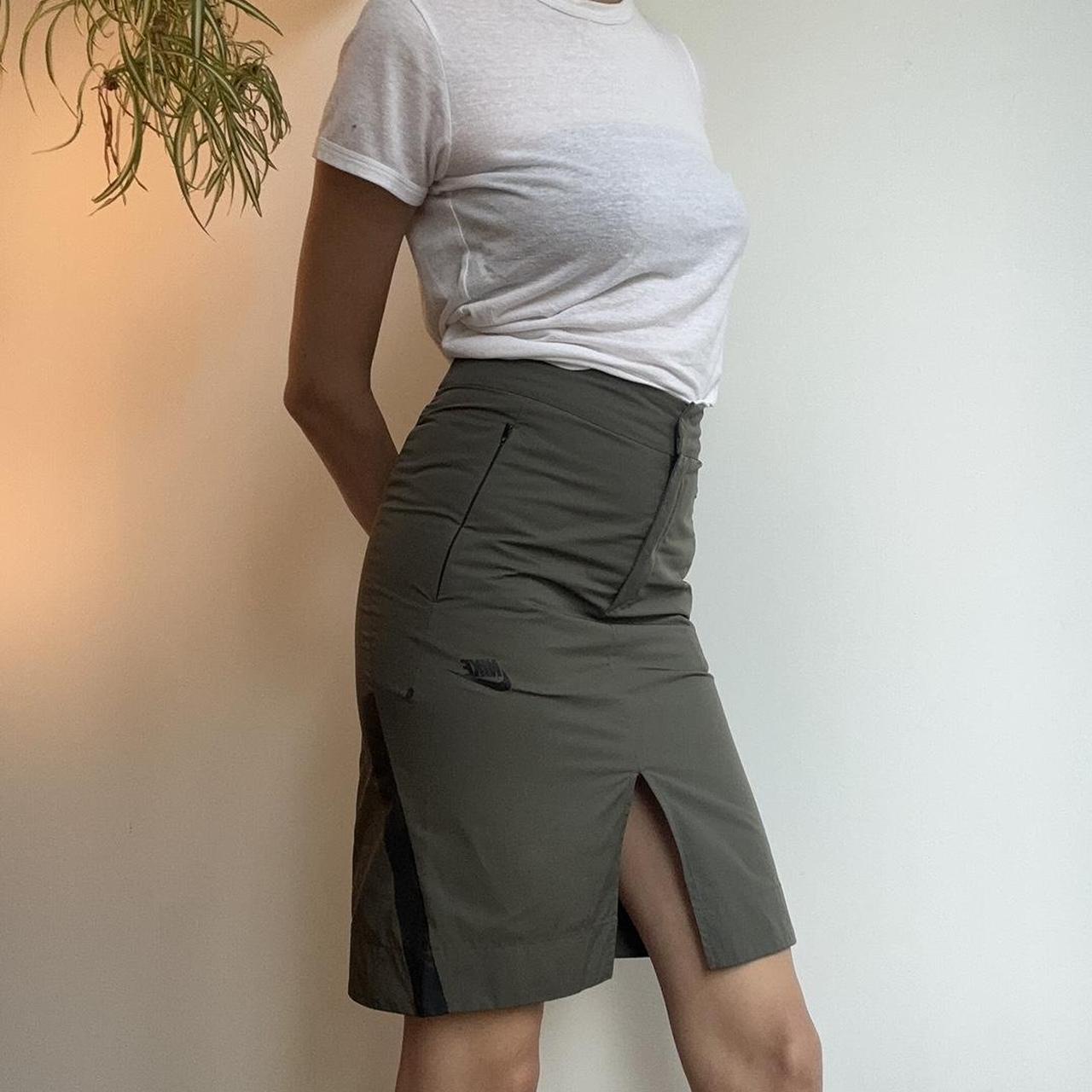 khaki army green mid length skirt from nike in size. Depop