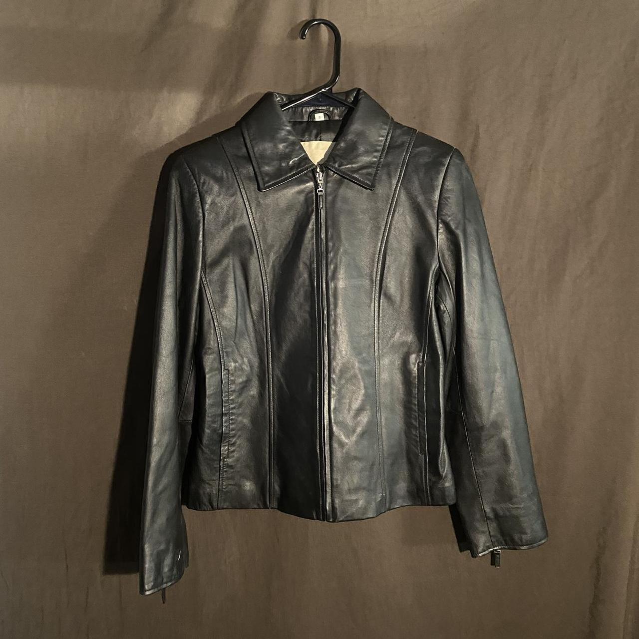 black leather jacket small tear on sleeve would be... - Depop