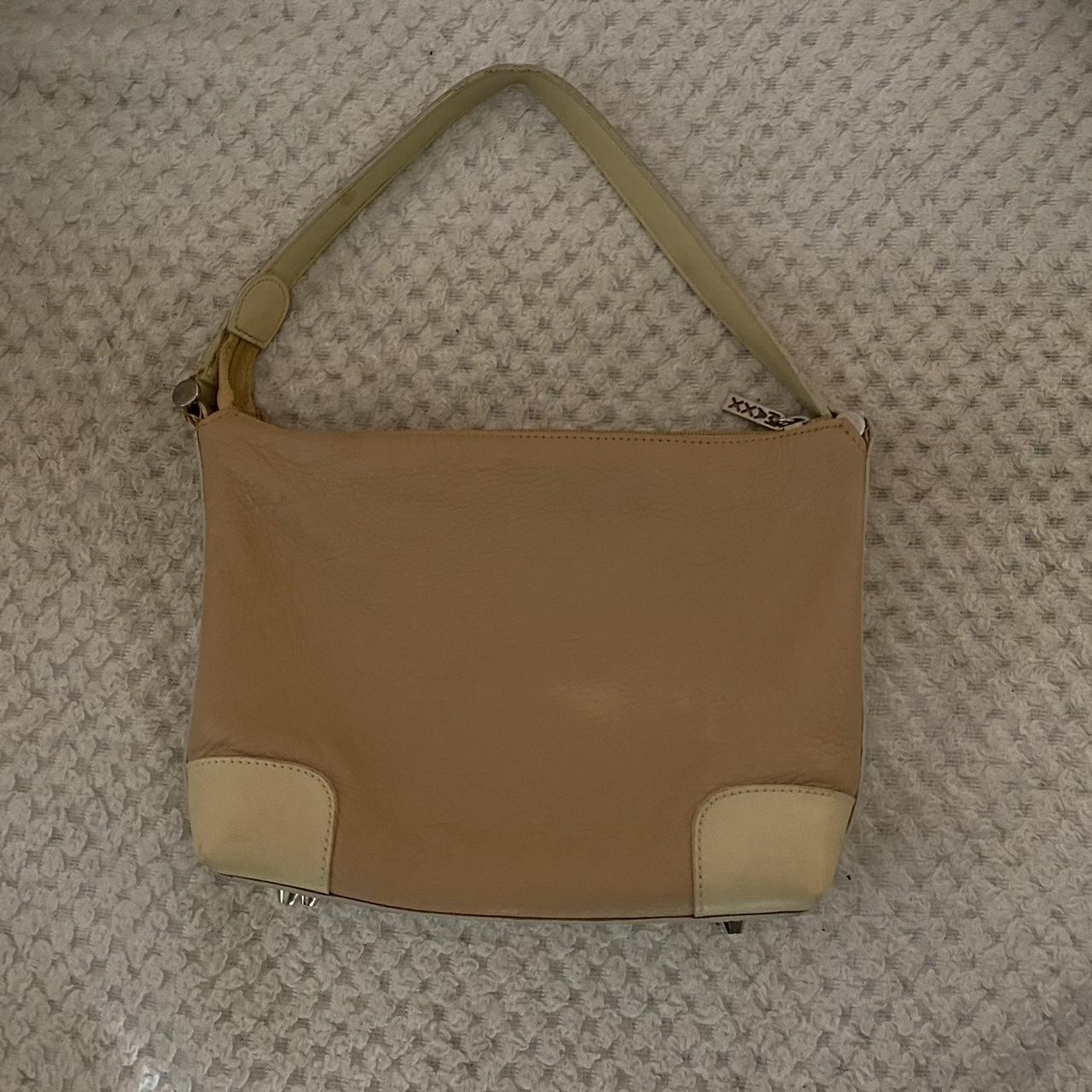 little tan bag inside is adorable has little things... - Depop