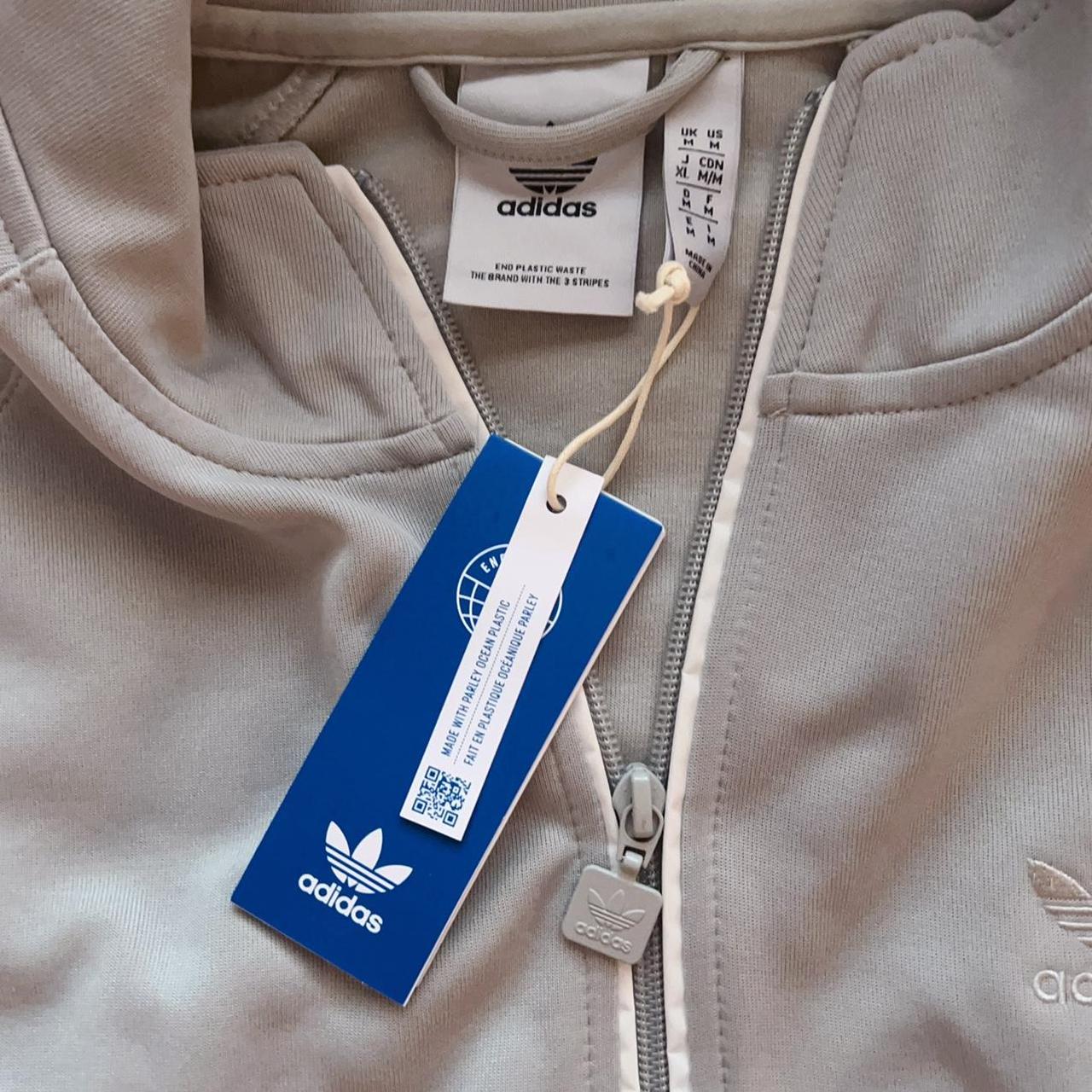 adidas rekive reflective track jacket in grey brand... Depop