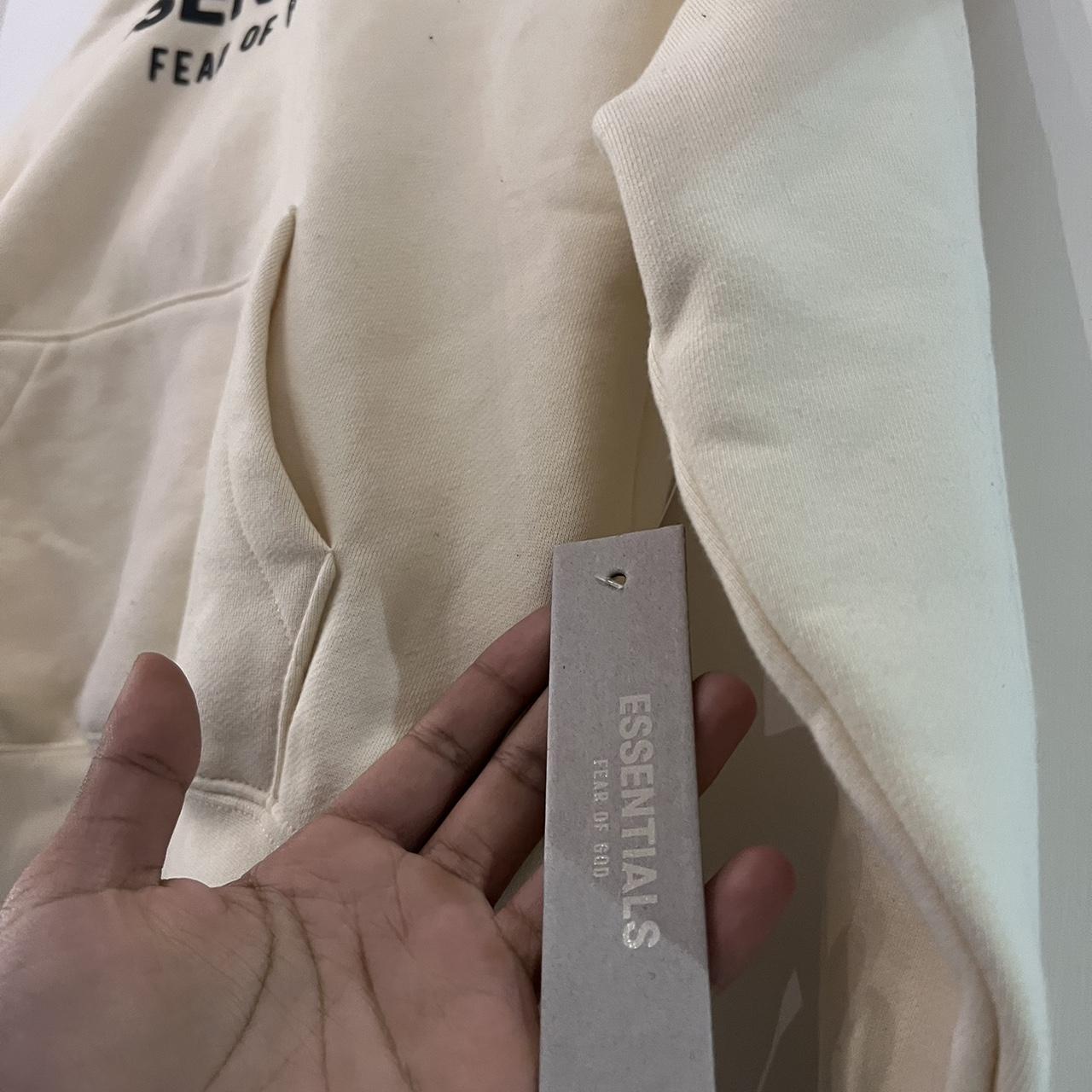 Fear Of God Essentials Kids Hoodie Cream/Buttercream... - Depop