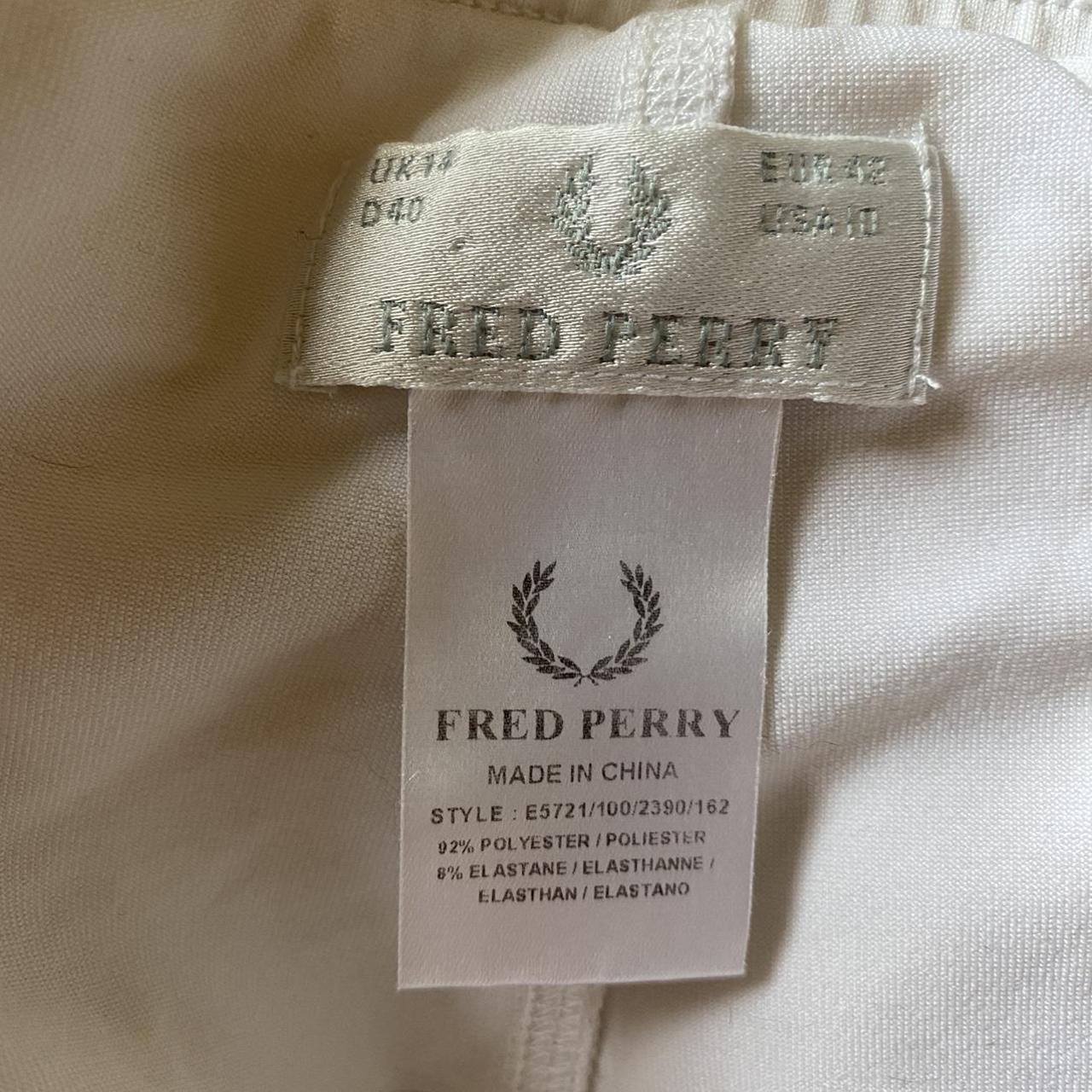 fred perry white skort with black detailing. has got... - Depop