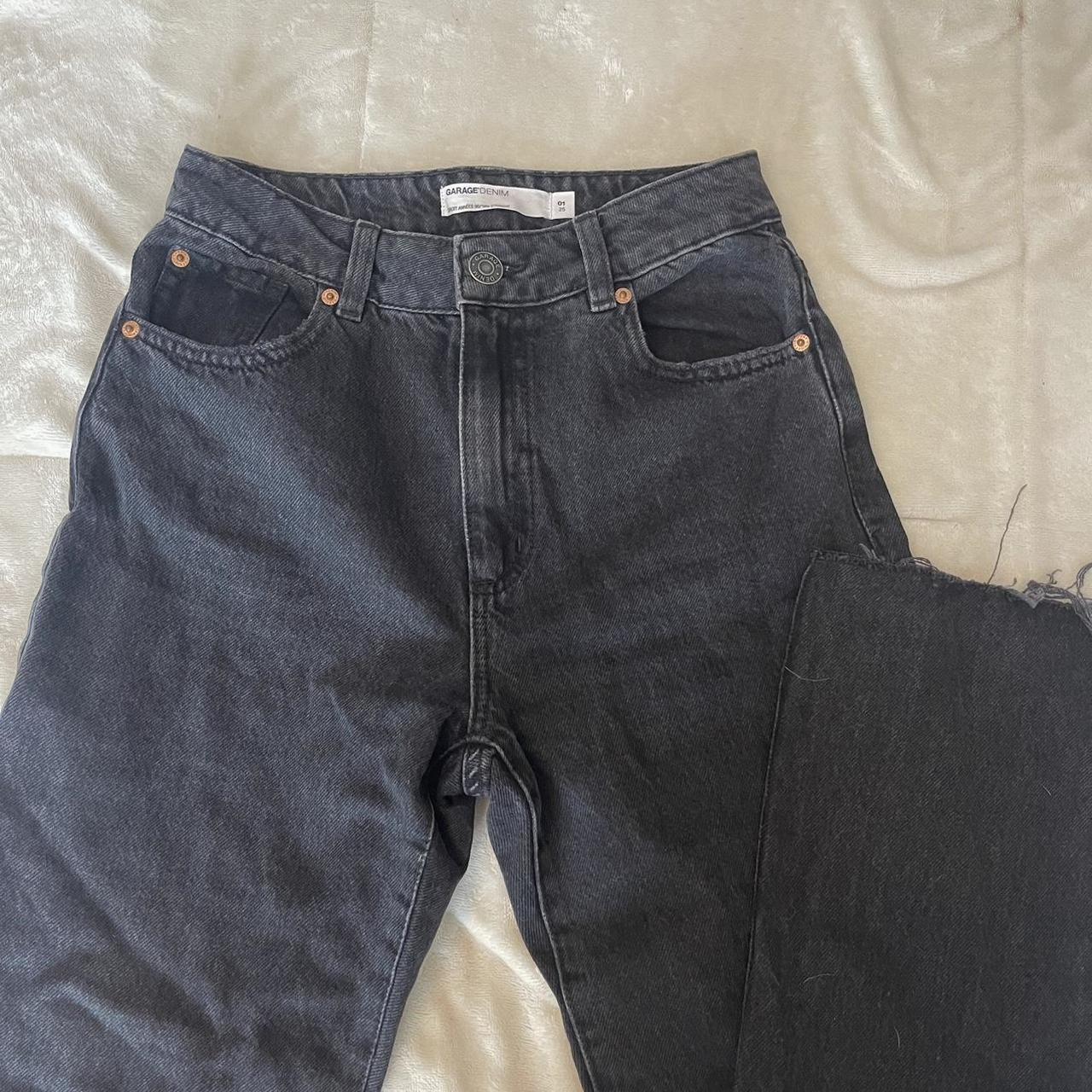 garage jeans in a grey/black color with rips on the... Depop