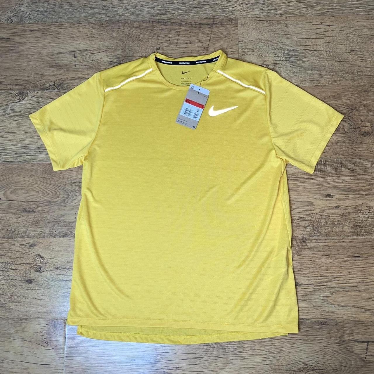 yellow nike gym top