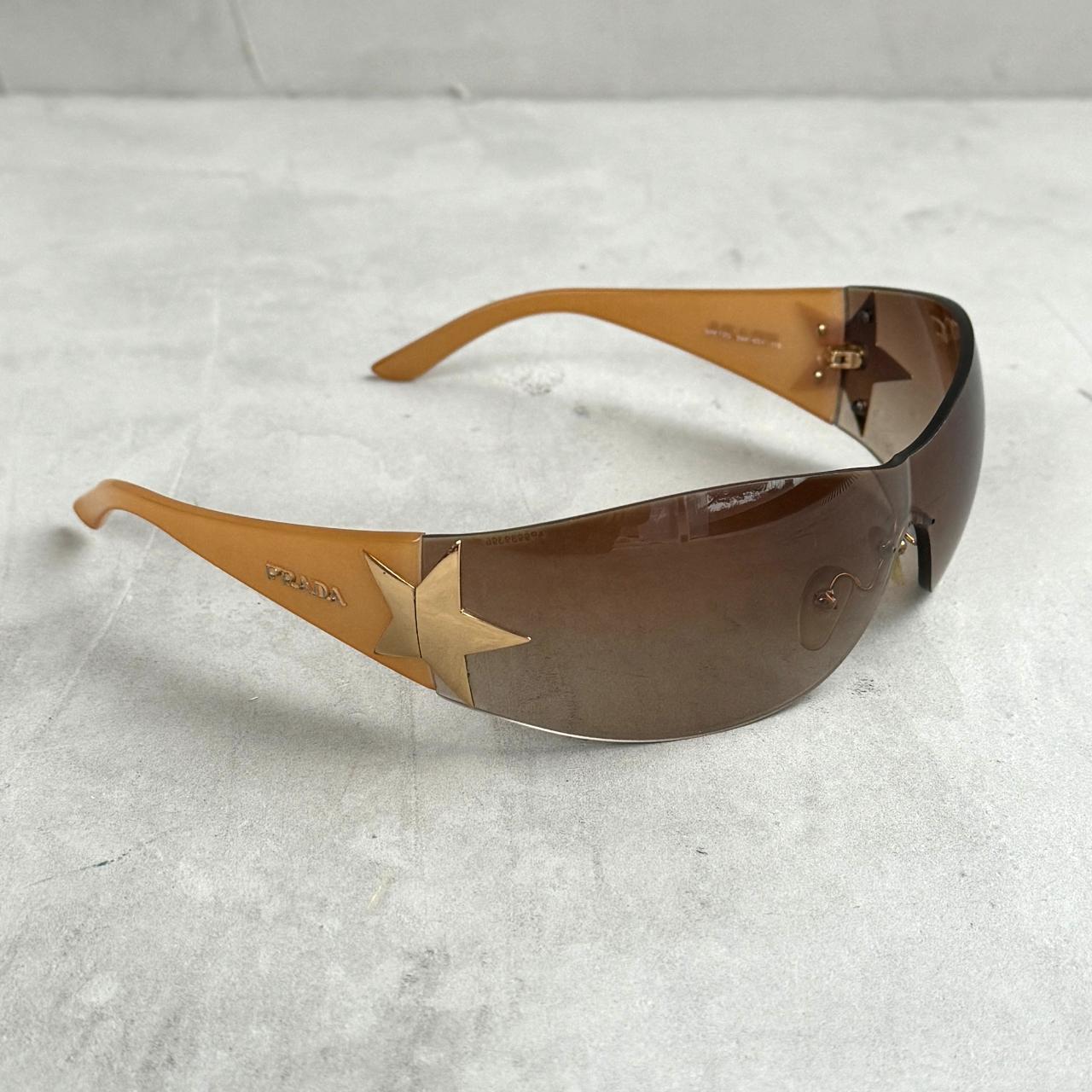 Prada wrap around sunglasses hotsell