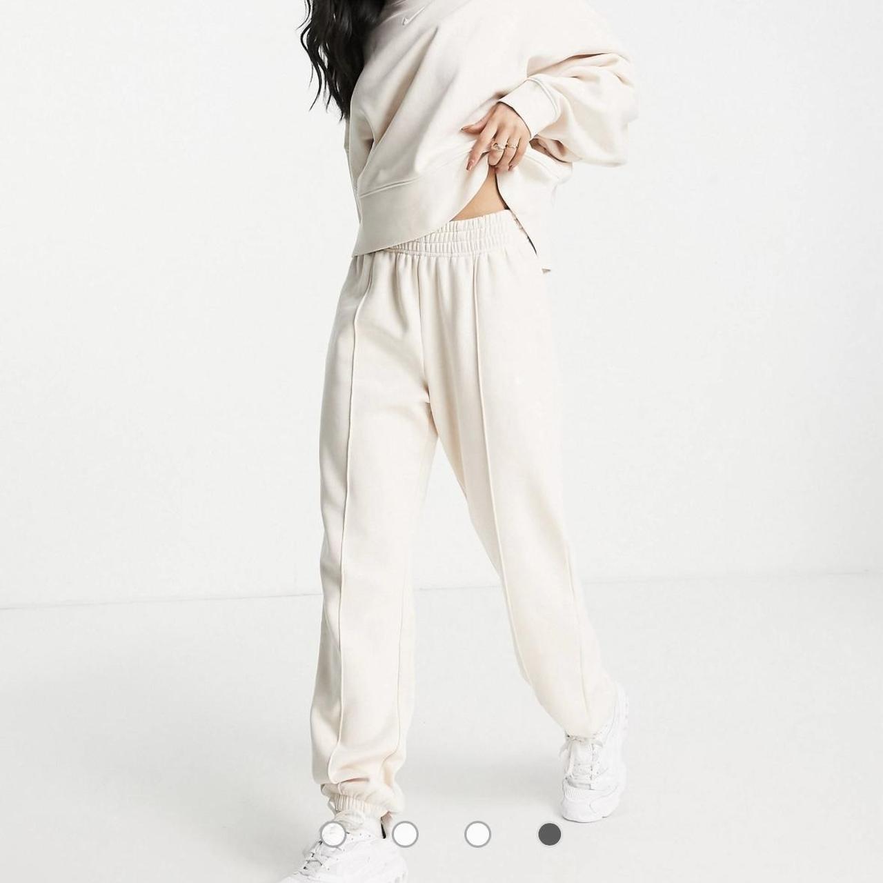 womens nike tracksuit cream