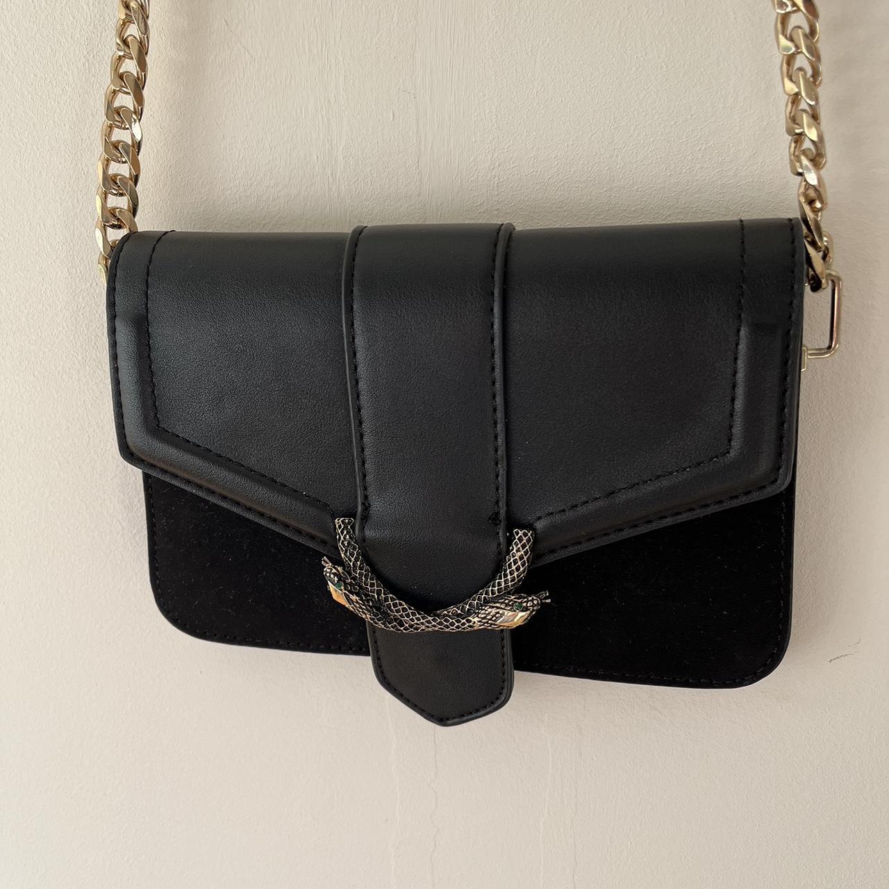 Sela snake outlet cross body bag