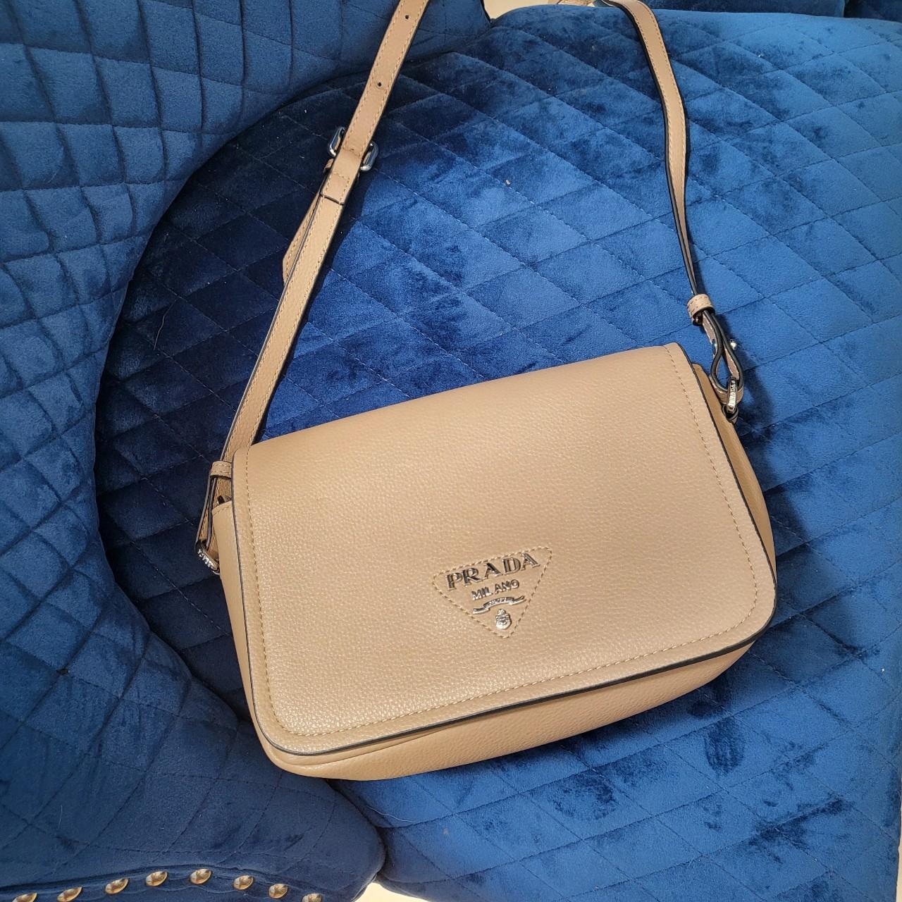 Prada bag beigh leather beautiful bag hardly used in